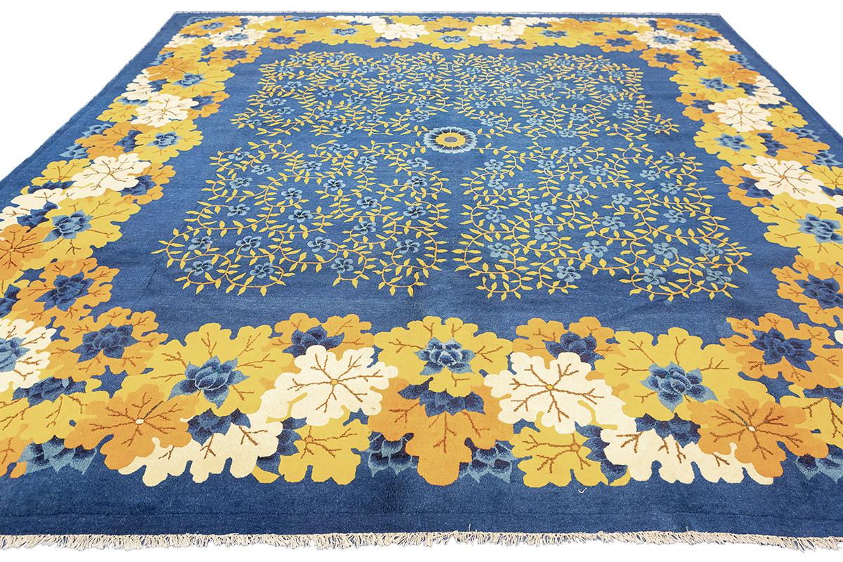 Delve into the rich and mesmerizing part of the of history with this magnificent Antique Peking Rug. Skillfully handwoven circa 1900, this exquisite piece epitomizes the craftsmanship and sophisticated design sensibilities of the era. Its generous