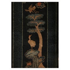 Tapis ancien de Pékin, bleu foncé avec des images de grues "Pao-Tou" - Rug 
Kilim