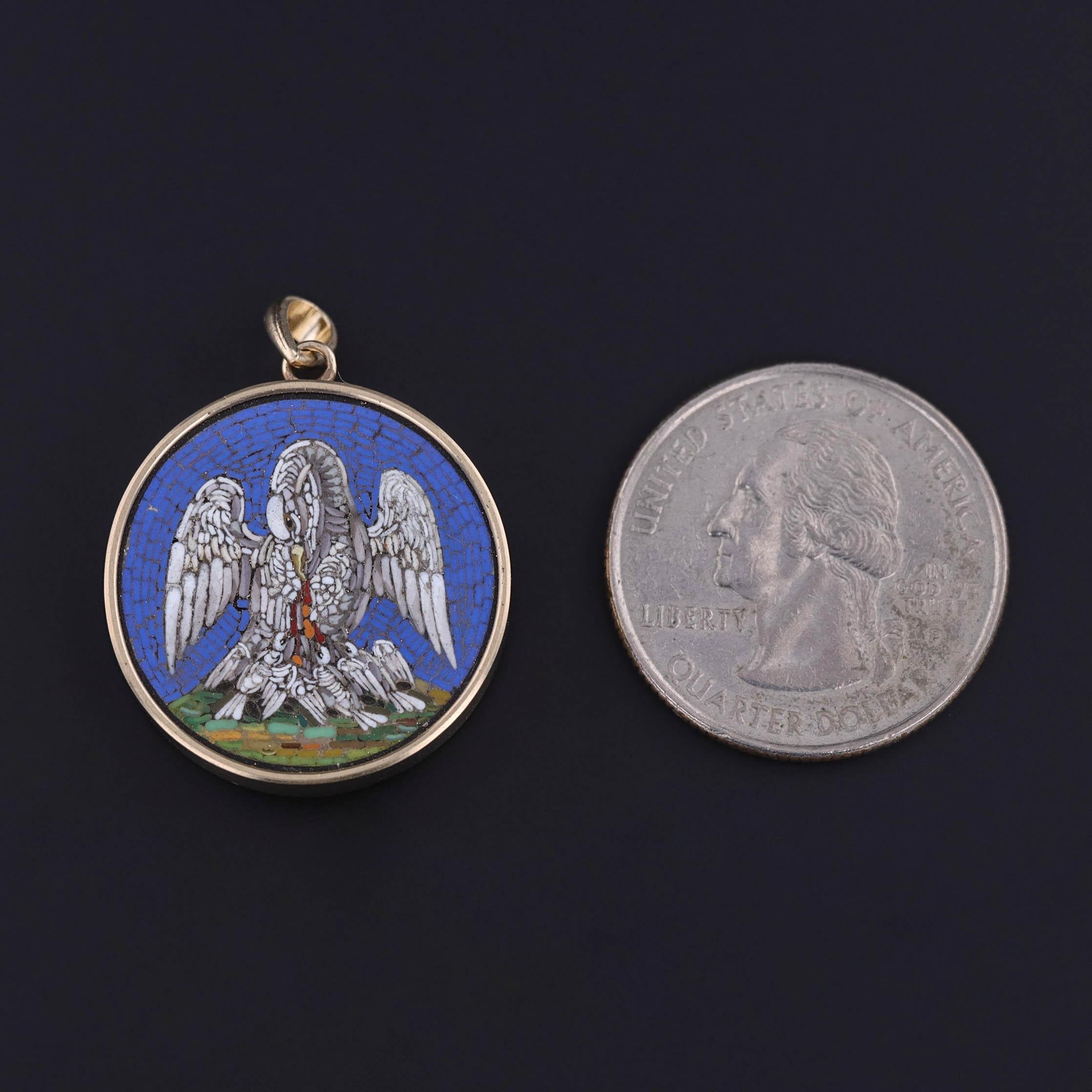 Antique Micromosaic “Pelican in Her Piety” Pendant in 14K Gold, circa 1830s

This exquisite pendant is a remarkable marriage of historic devotion and fine artistry. Originally an antique paperweight, this micromosaic medallion has been reimagined as