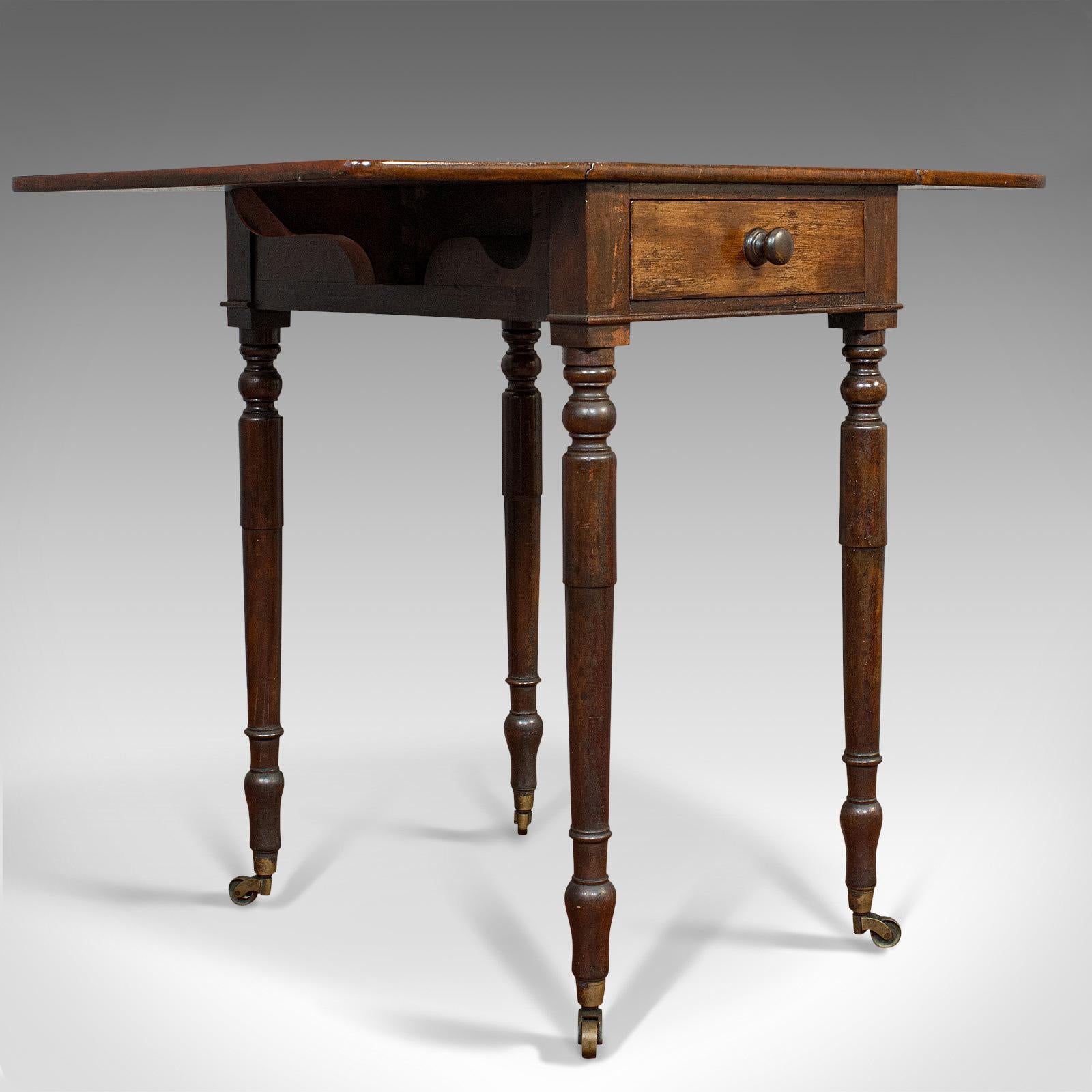 This is an antique Pembroke table. An English, mahogany drop-leaf occasional table, dating to the Regency period, circa 1820.

A delightful Regency piece
Displays a desirable aged patina
Rich mahogany resplendent in consistent, rich hues
Fine