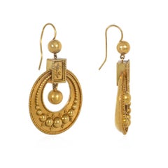 Pendientes de aro con colgante antiguo y diseño de cuentas