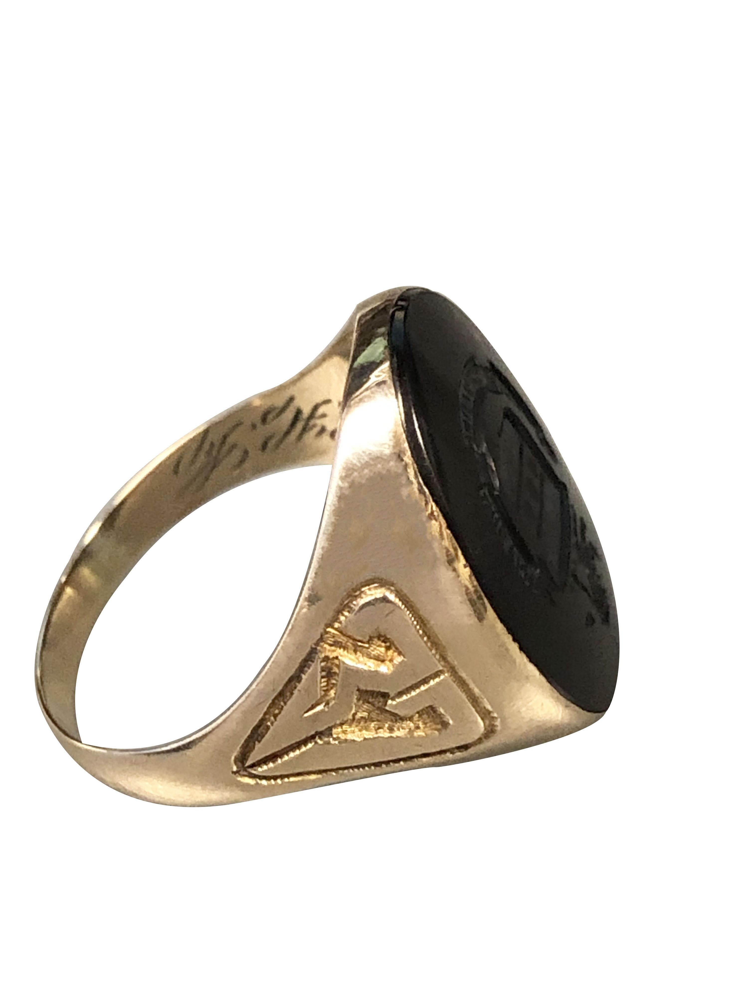 Circa 1930s Penn Club of Philadelphia 10k Yellow Gold and Onyx Signet Ring, the top measures 3/4 X 5/8 inch, a deep carved intaglio of the Penn Club and the wording, 
