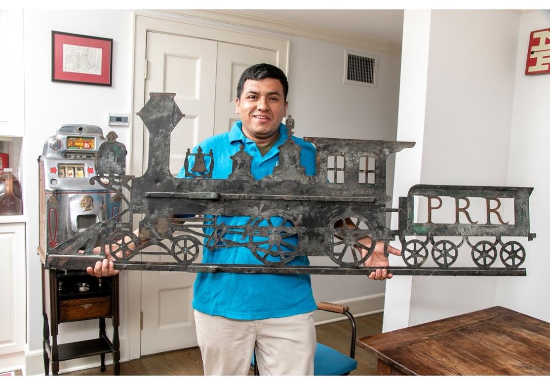 Rare and historical Folk Art iron railroad sign from a Pennsylvania Station. Of impressive size and very well crafted, with an incredible age patina, a Museum Quality piece of American Folk Art. A flat openwork piece with all the details of an