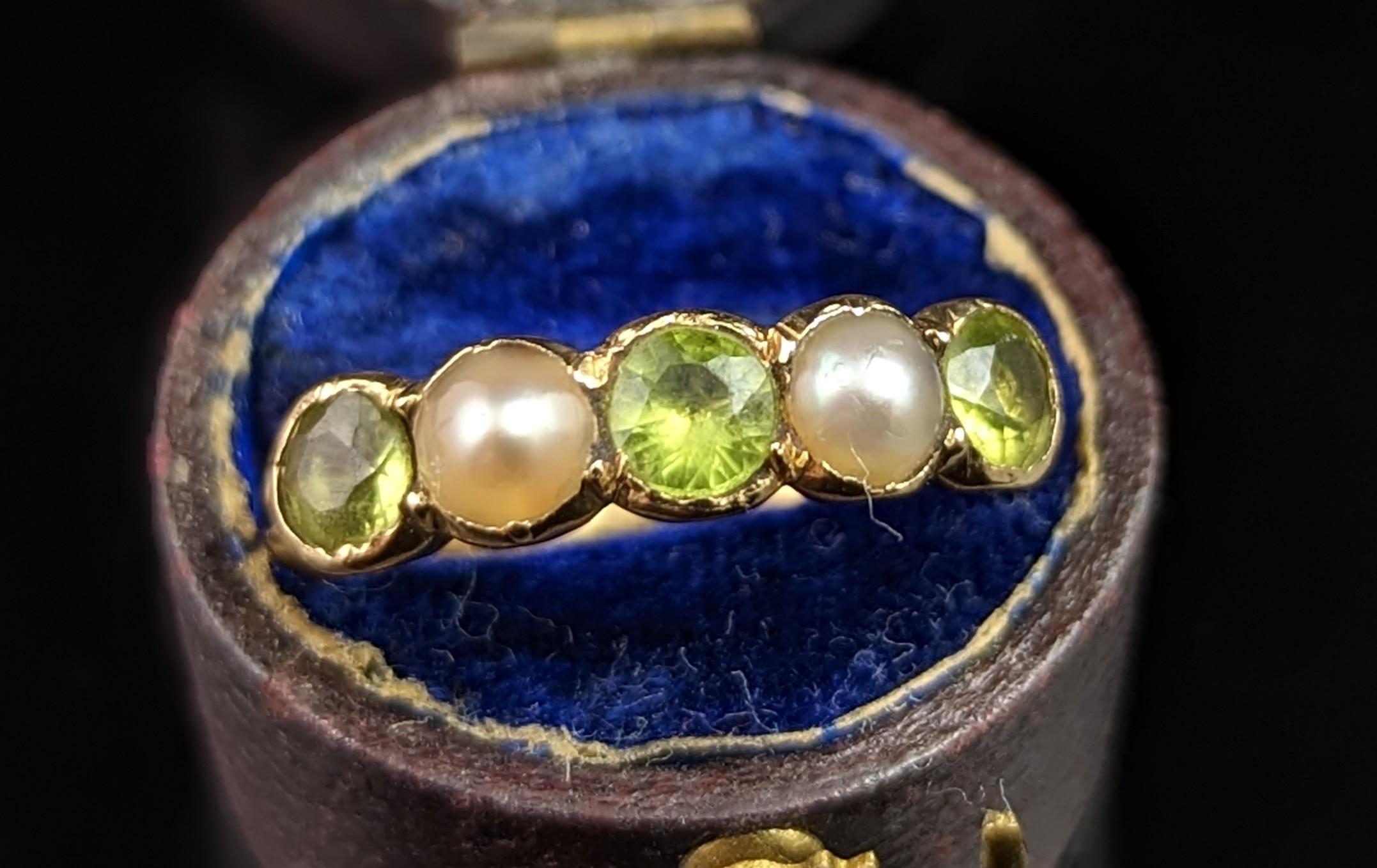 This antique Peridot and split pearl half hoop ring is shockingly beautiful with a rich and slightly mystical feel to it.

Reminiscent of the Georgian era this beautiful ring has alternating round cut vibrant green peridot and creamy split pearls