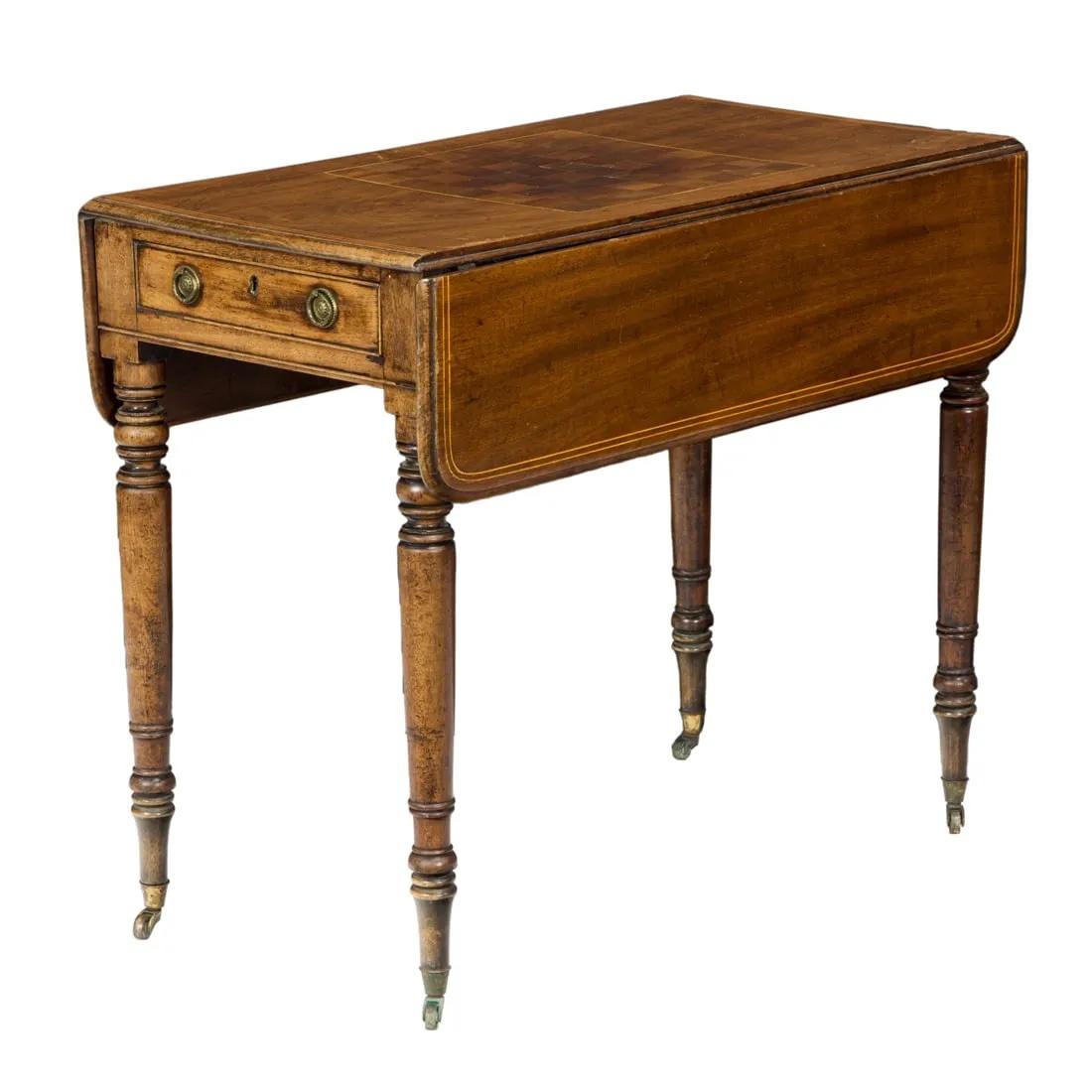 Circa 1800 Antique Period English Regency Mahogany Line Inlay Drop Leaf Games Table with a single drawer surmounting the inlaid playing surface flanked with two drop leaves, and rising on turned legs. Dimensions:  29.5