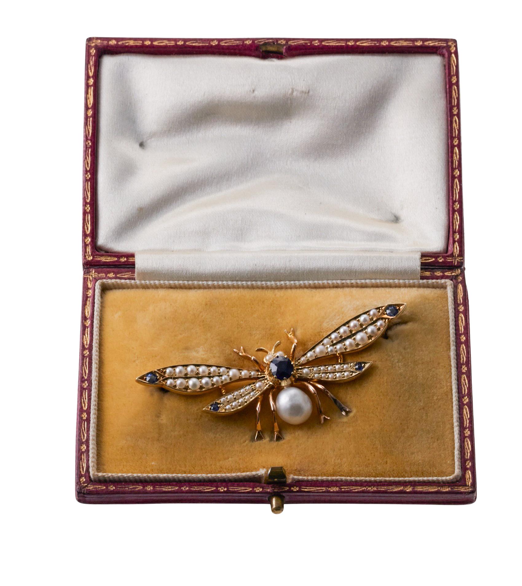Antique 18k gold insect brooch, set with pearls and blue sapphires. The brooch measures 55mm x 22mm. Comes in original antique fitted box. Marked 750 and with scratched on numbers. Weight - 7 grams. 