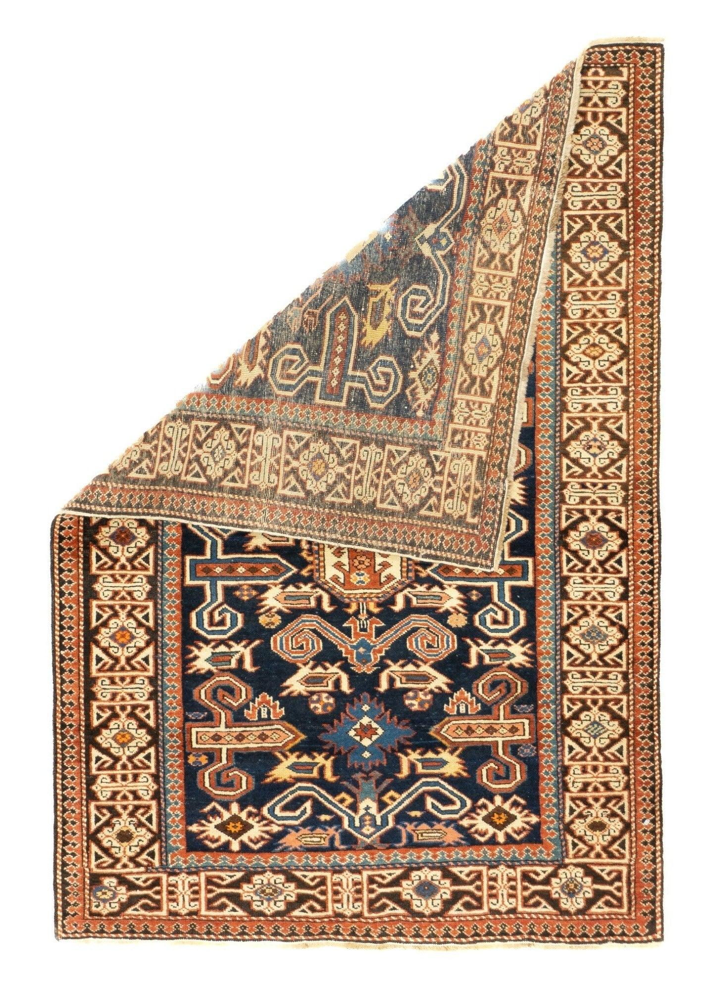 Antique Perpedil Rug 2'11'' x 4'3''.  Generally in scatter sizes, from eastern Caucasus, all wool; geometric small scale patterns. A Kuba sub-type. Usually dark blue or cream grounds. A few prayer rugs. 