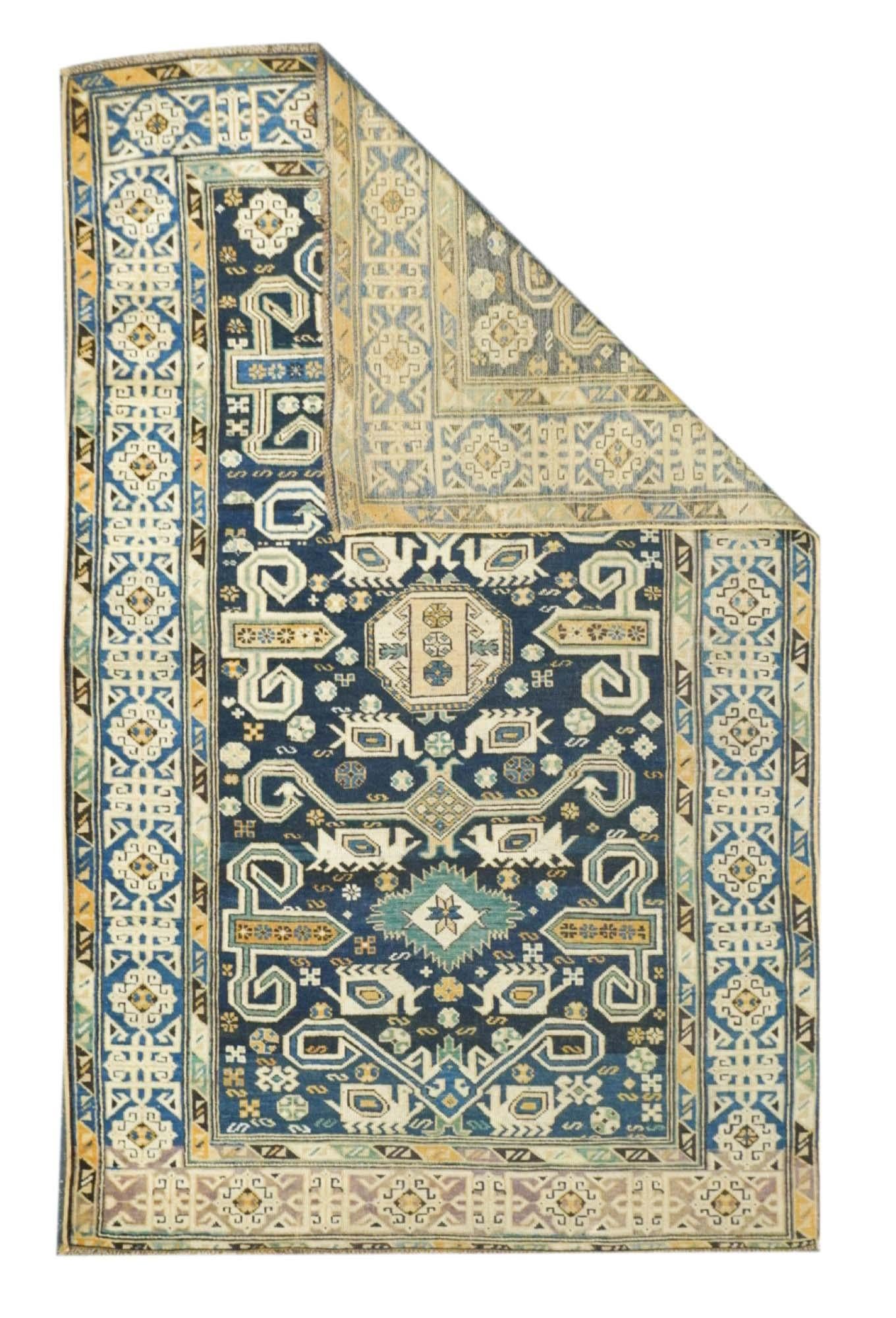 Antique Perpedil Rug 3'11'' x 6'3''. Generally in scatter sizes, from eastern Caucasus, all wool; geometric small scale patterns. A Kuba sub-type. Usually dark blue or cream grounds. A few prayer rugs. 