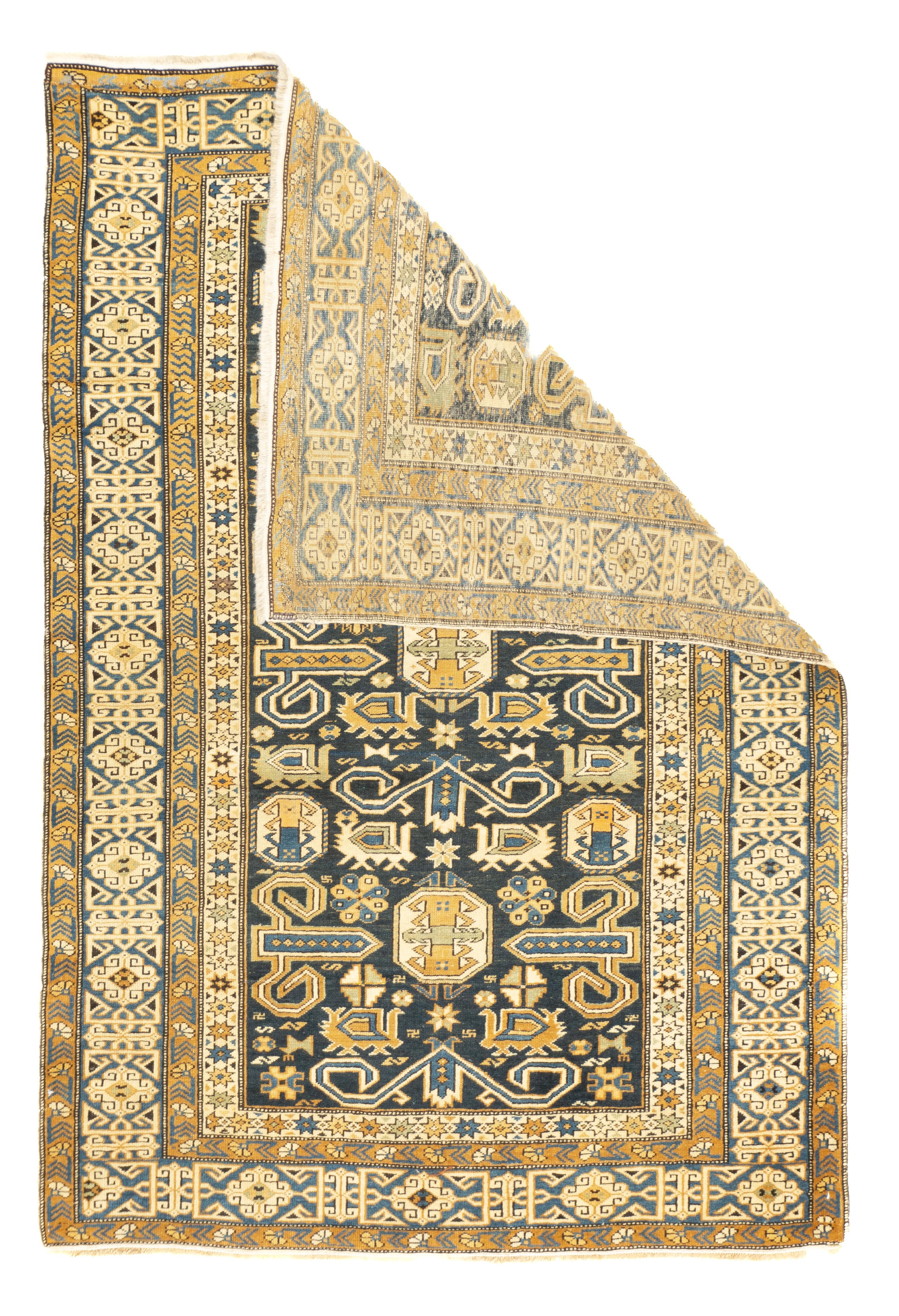 Antique Perpedil Rug 3'3'' x 4'11''. Generally in scatter sizes, from eastern Caucasus, all wool; geometric small scale patterns. A Kuba sub-type. Usually dark blue or cream grounds. A few prayer rugs. 