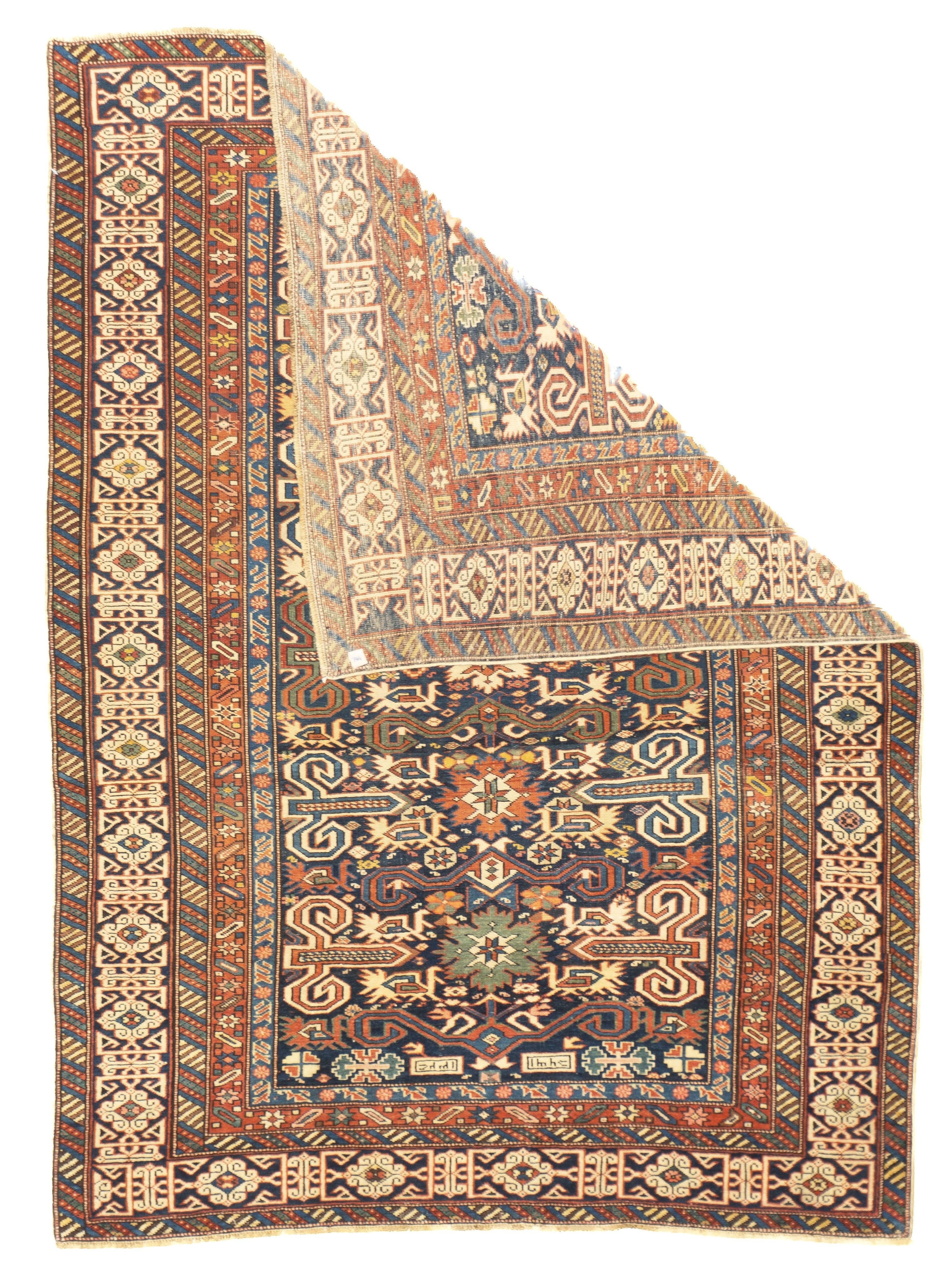 Antique Perpedil Rug 3'7'' x 4'10''. East Caucasian village scatter with the characteristic Perpedil design of ram's horns, daggers, octagons and birds, on a navy ground. Red, rust and green details. Navy main border of ecru knots and brackets.