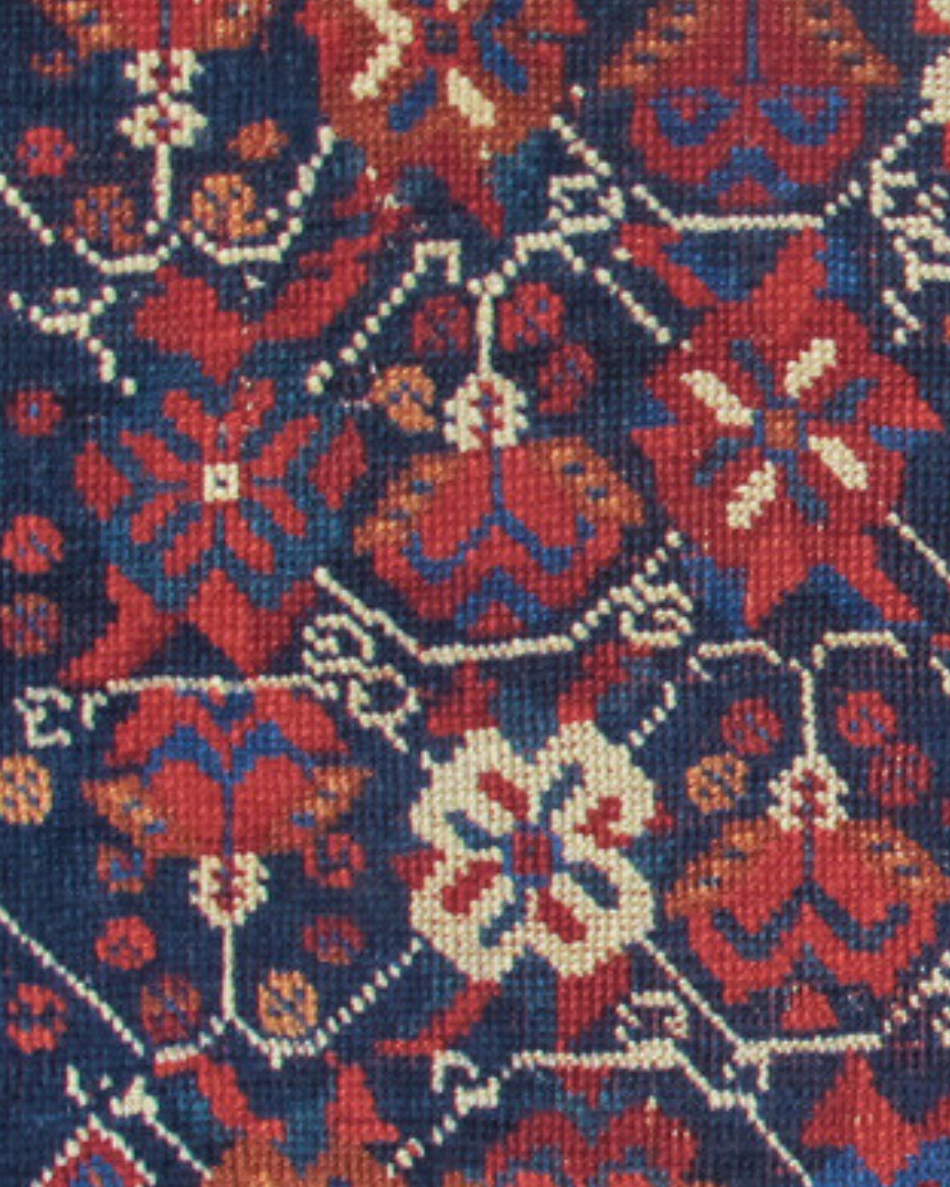 Antique Persian Afshar Bagface Bag, Late 19th Century

This charming Afshar bag face uses rich saturated vegetable colors and soft glossy wool, with rows of alternating flowers and blossom heads drawn against the indigo field. The vegetal repertoire