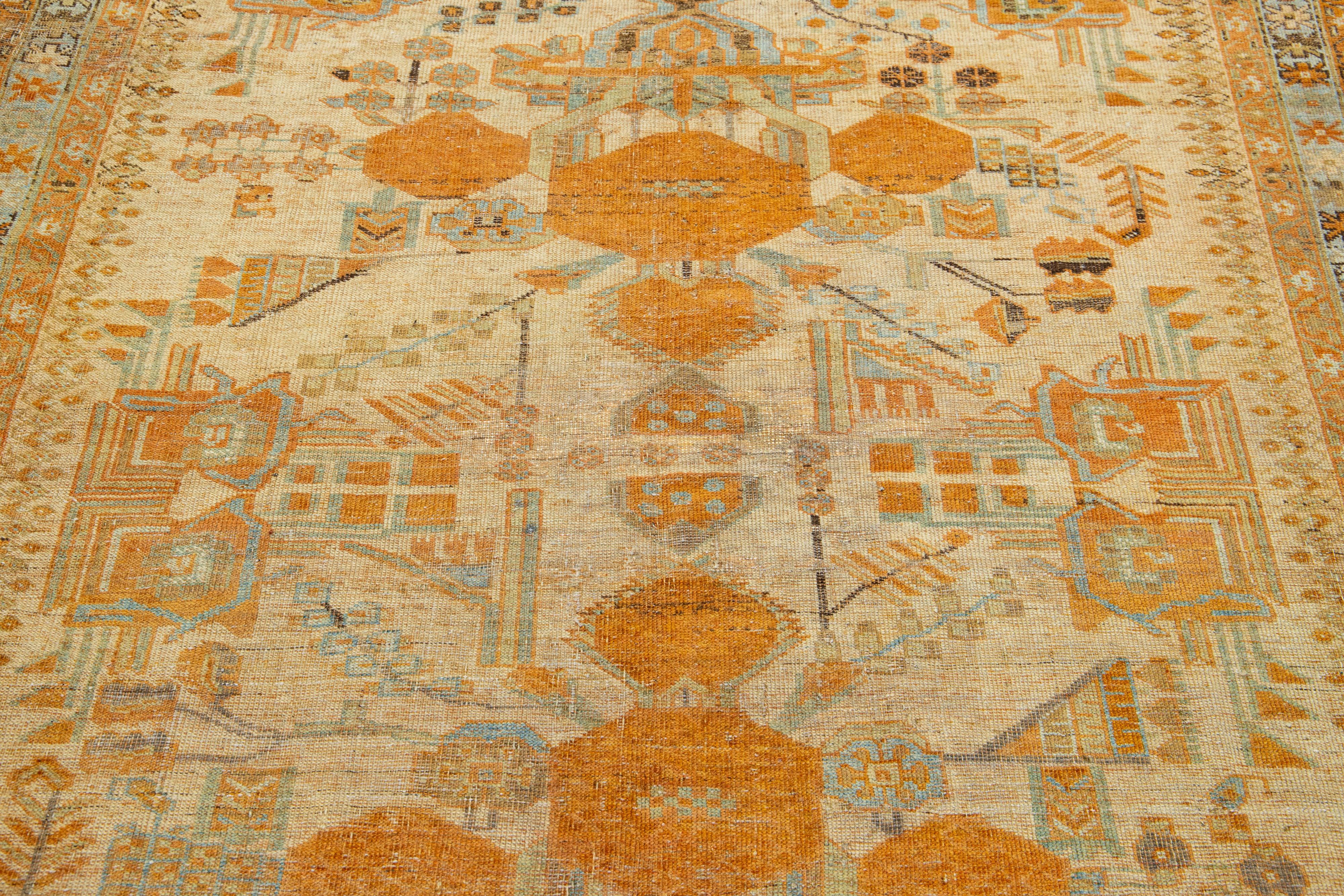 20th Century Antique Persian Afshar Handmade Tan & Orange Wool Rug with Allover Design For Sale