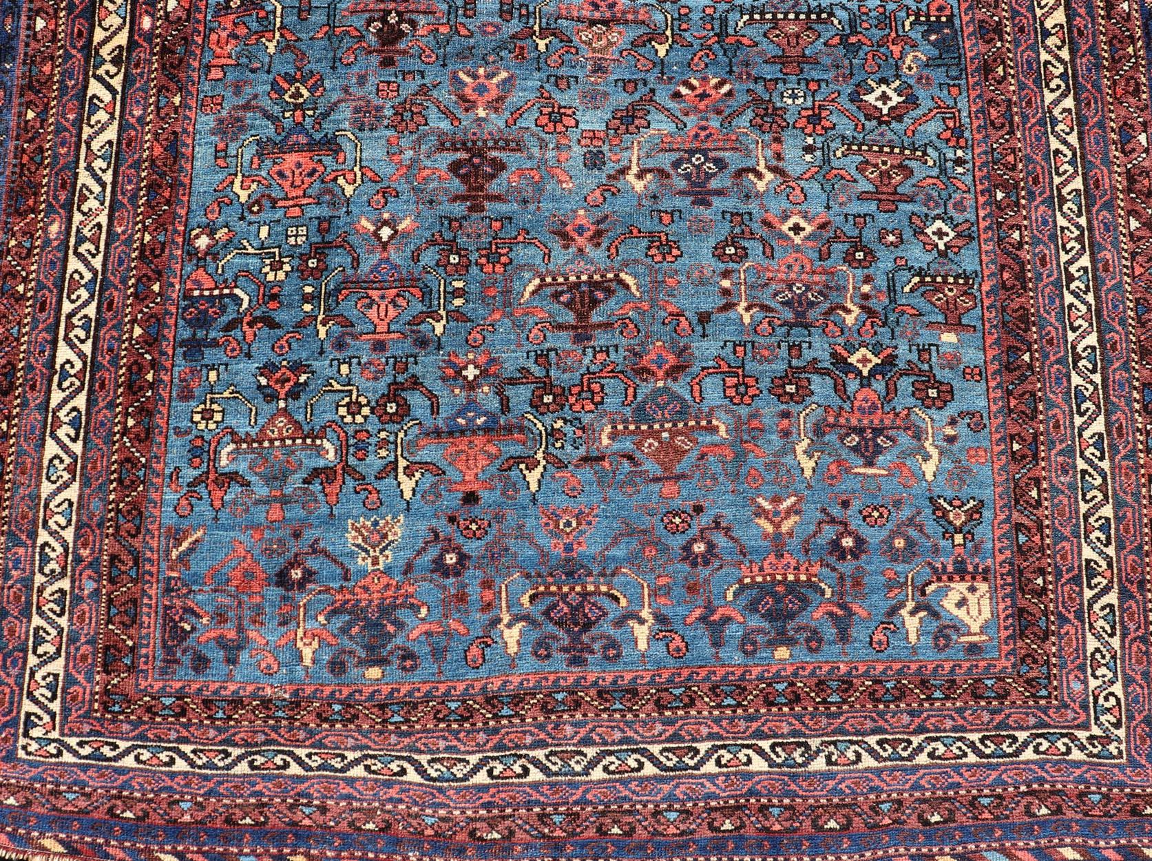 Malayer Antique Persian Afshar Rug in Beautiful Blue Background With Tribal Motifs  For Sale