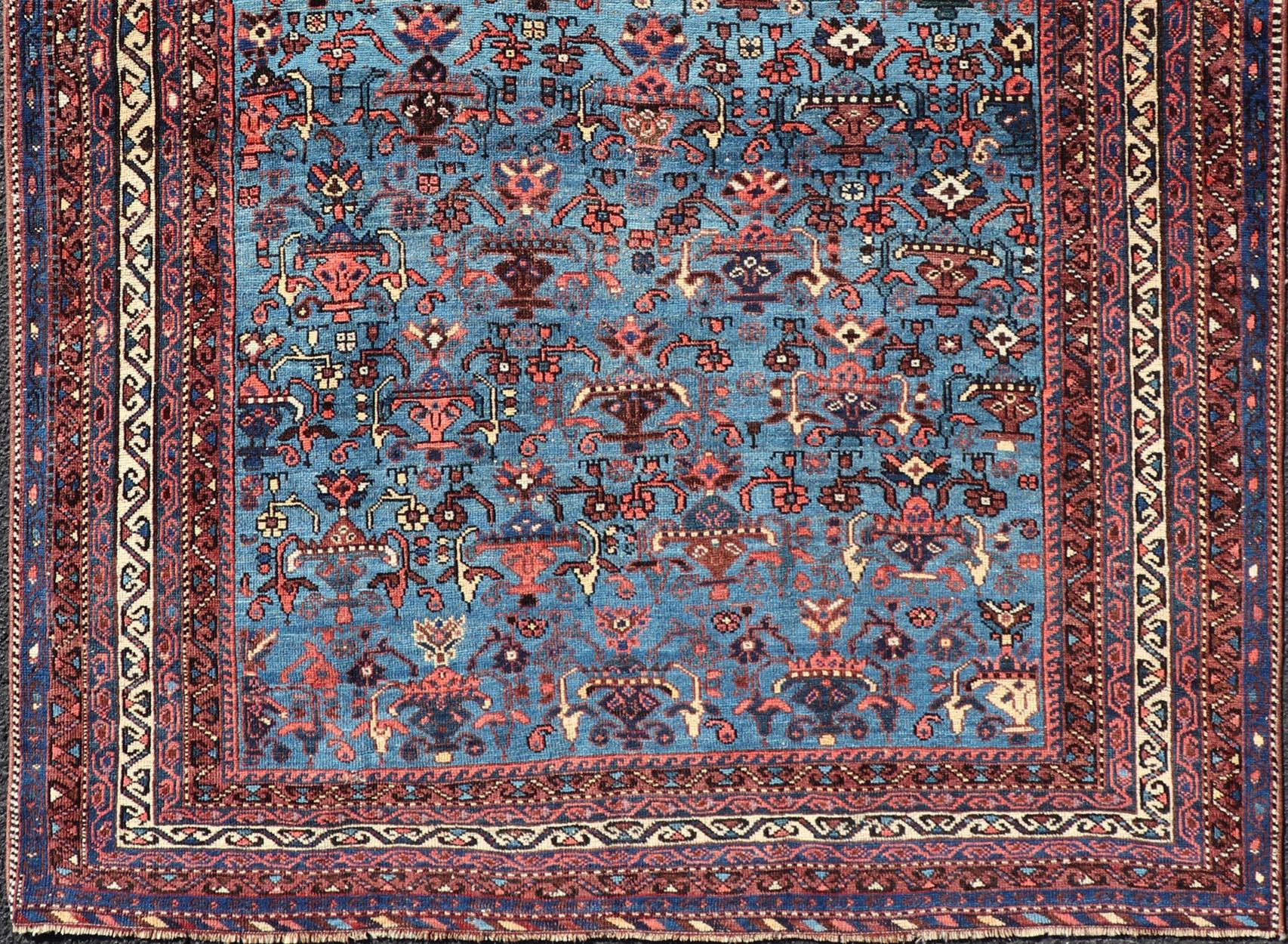 Wool Antique Persian Afshar Rug in Beautiful Blue Background With Tribal Motifs  For Sale