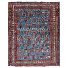 Antique Persian Afshar Rug in Beautiful Blue Background With Tribal Motifs
