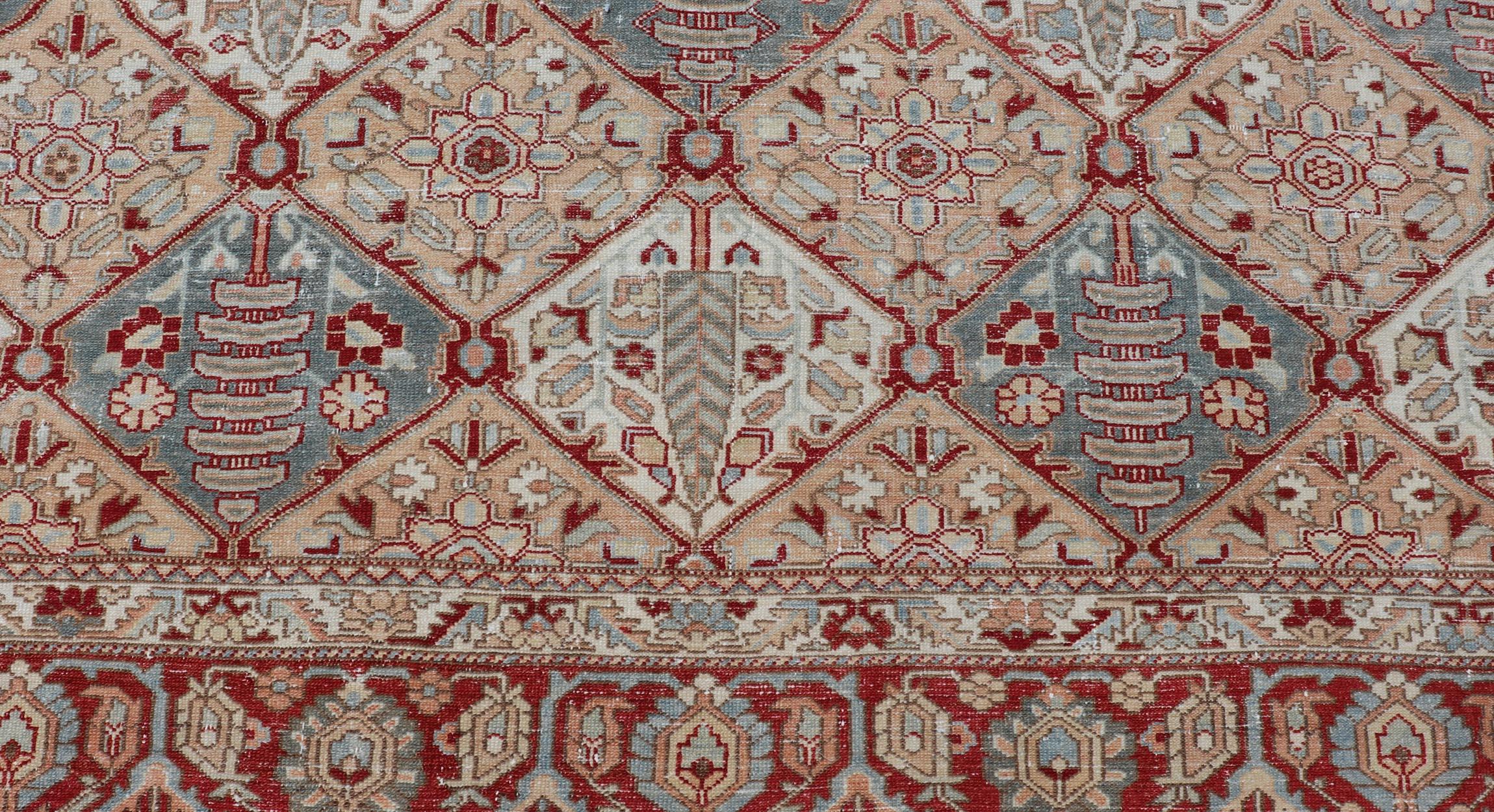 Antique Persian All-Over Diamond Design Bakhtiari rug in Multi Colors With Red. Keivan Woven Arts / rug R20-0836, country of origin / type: Iran / Bakhtiari, circa 1920
Measures: 12'11 x 15'6 
Persian Bakhtiari rugs are in fact tribal pieces that