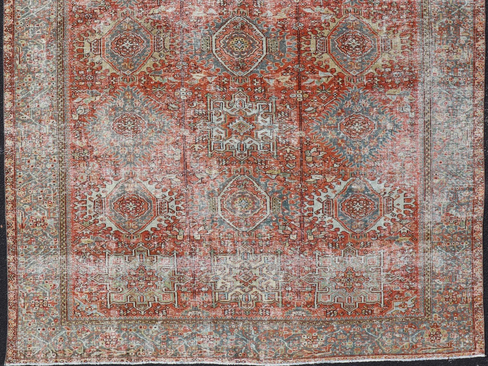 20th Century Antique Persian All-Over Heriz Rug with All-Over Geometric Medallion Design For Sale