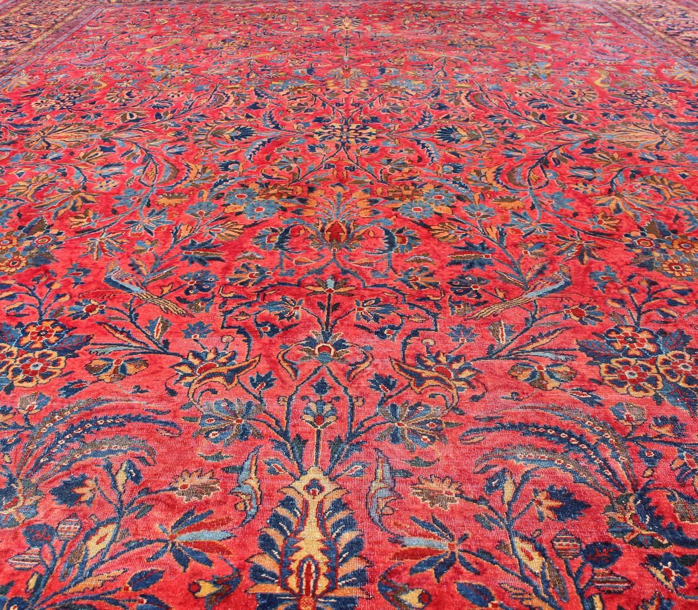 Antique Persian Kashan Rug With a All-Over Design On A Red Field and Blue Border For Sale 4