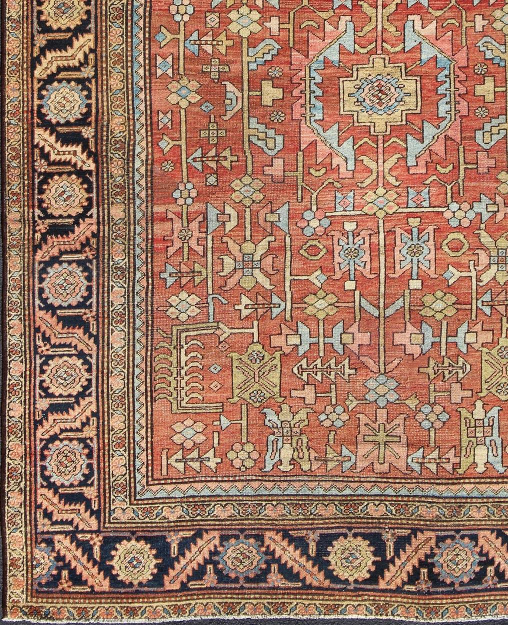 All-Over Geometric Design Antique Persian Serapi Rug. Keivan Woven Arts / rug /S12-0301, country of origin / type: Iran / Kerman , circa 1890.

Measures: 9'5 x 12'8.

This antique Persian Serapi from late 19th century displays a charming and rich