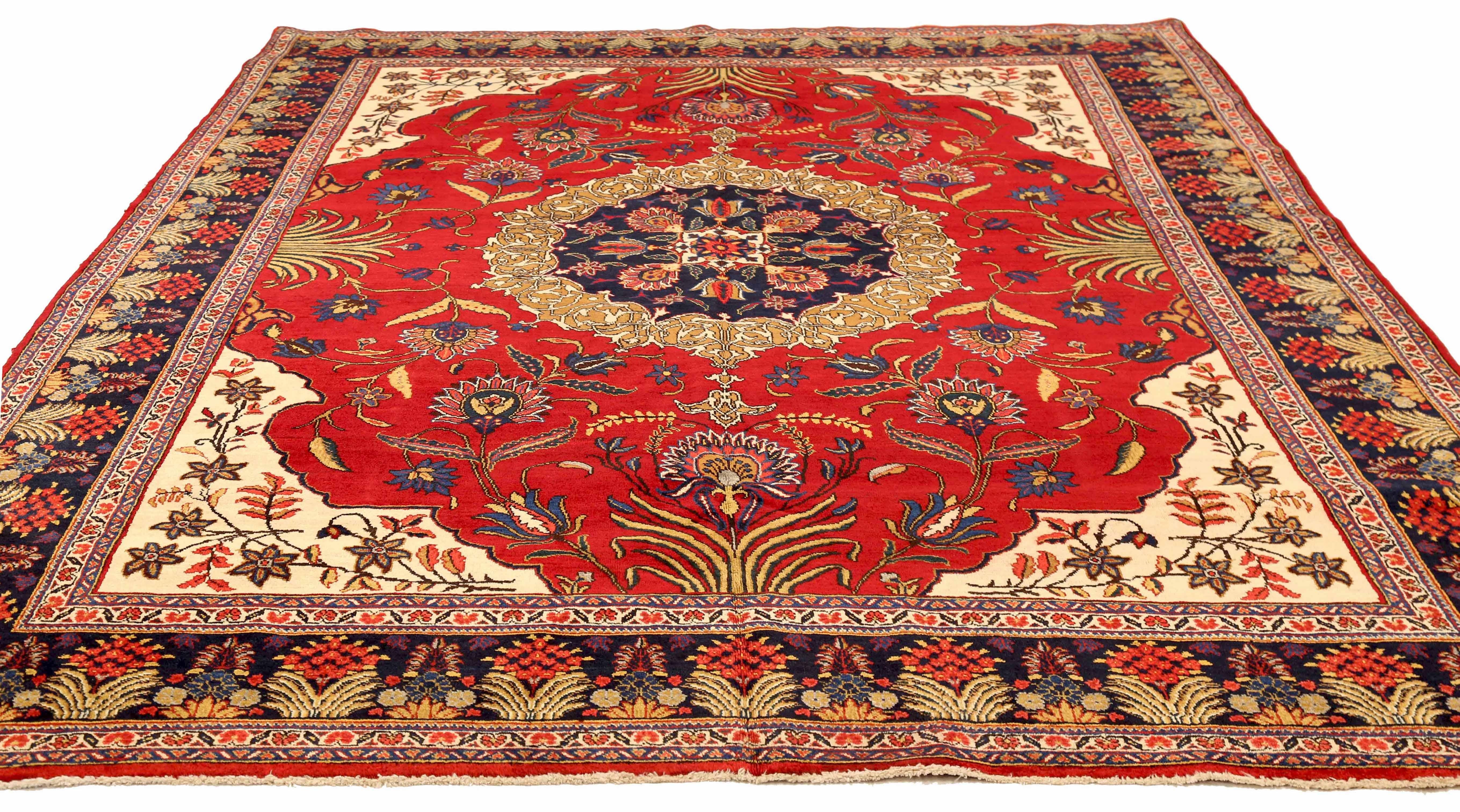 Antique Persian area rug handwoven from the finest sheep’s wool. It’s colored with all-natural vegetable dyes that are safe for humans and pets. It’s a traditional Ardabil design handwoven by expert artisans. It’s a lovely area rug that can be