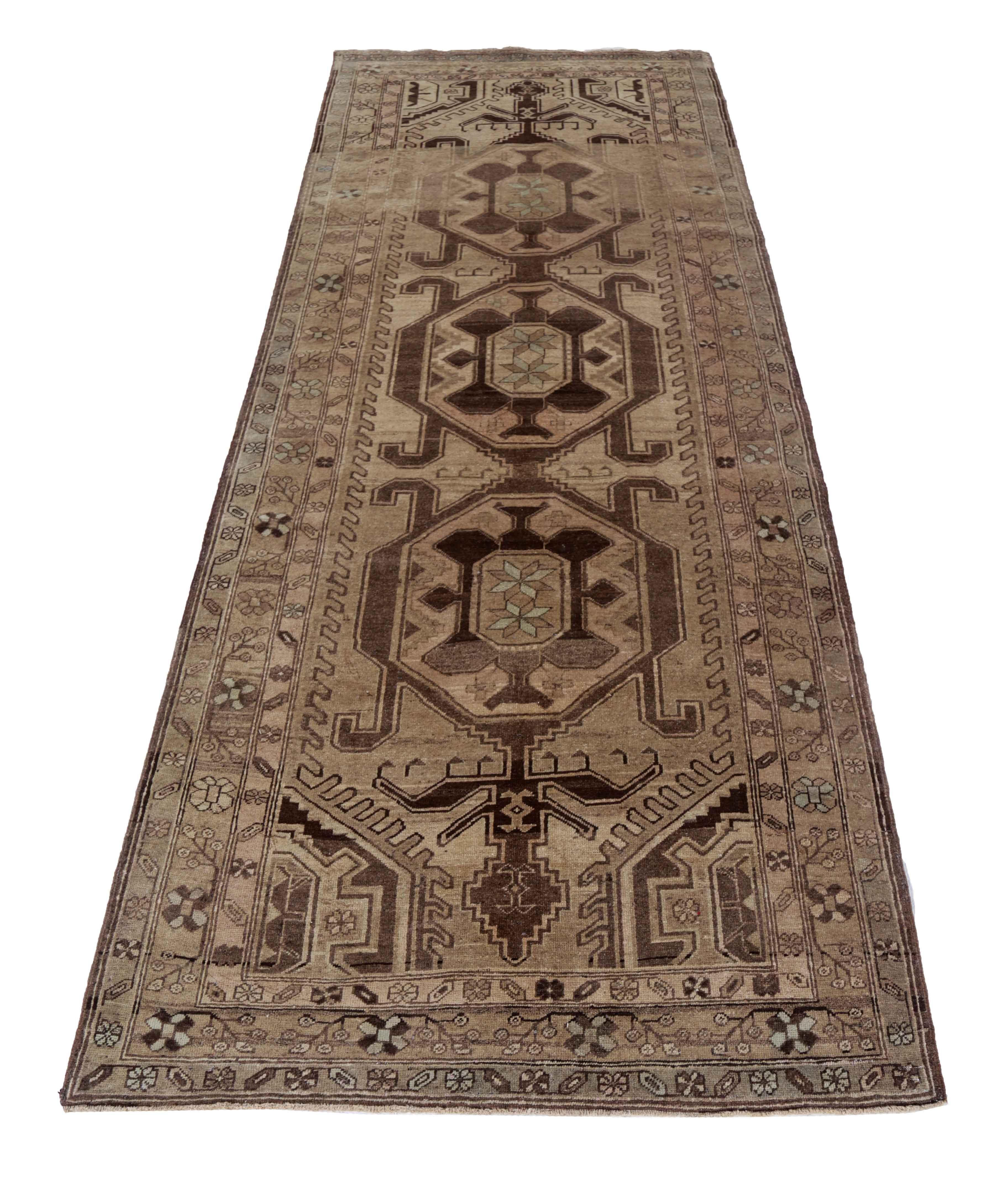 Antique Persian area rug handwoven from the finest sheep’s wool. It’s colored with all-natural vegetable dyes that are safe for humans and pets. It’s a traditional Azerbaijan design handwoven by expert artisans. It’s a lovely area rug that can be