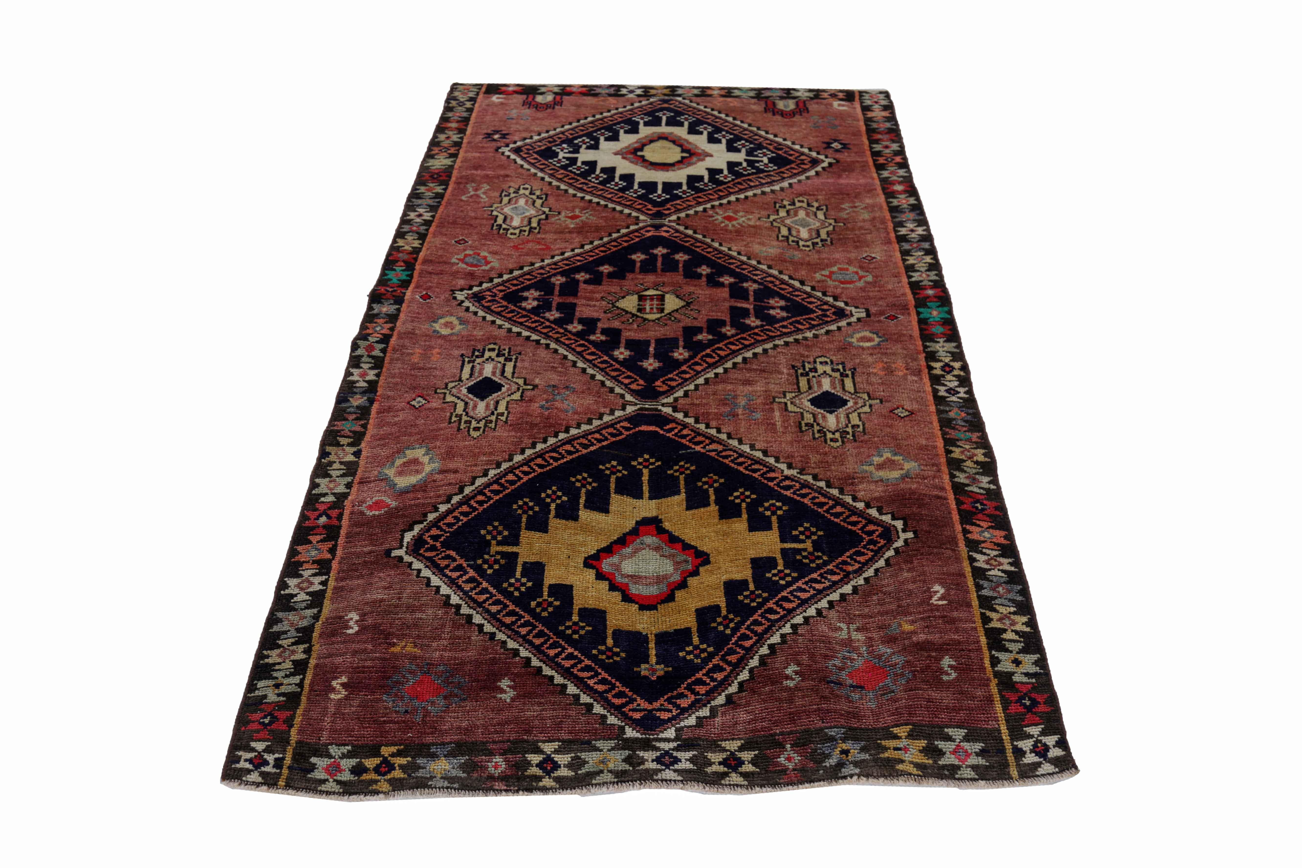 Antique Persian area rug handwoven from the finest sheep’s wool. It’s colored with all-natural vegetable dyes that are safe for humans and pets. It’s a traditional Azerbaijan design handwoven by expert artisans. It’s a lovely area rug that can be