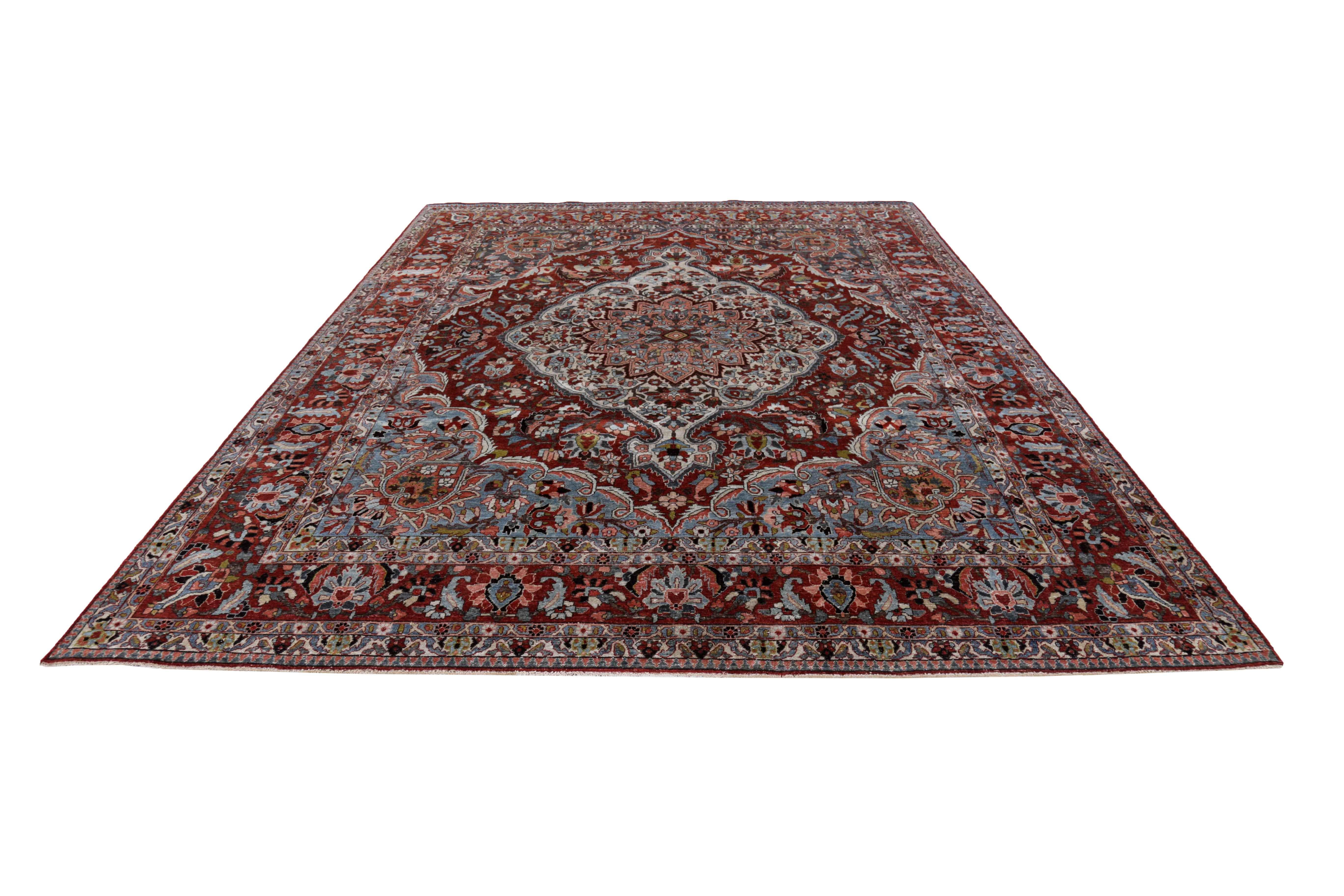 Antique Persian area rug handwoven from the finest sheep’s wool. It’s colored with all-natural vegetable dyes that are safe for humans and pets. It’s a traditional Bakhtiar design handwoven by expert artisans. It’s a lovely area rug that can be