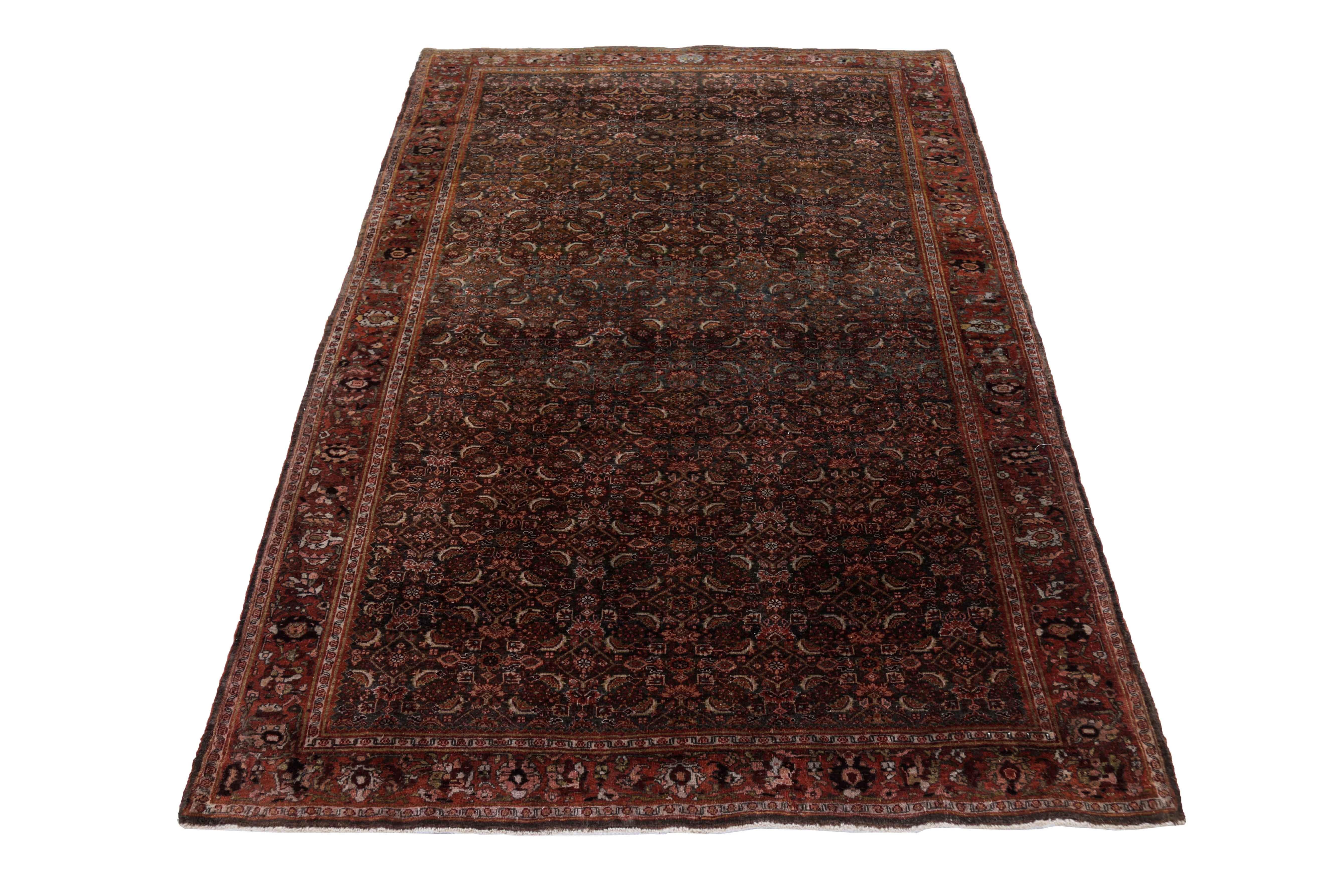 Antique Persian area rug handwoven from the finest sheep’s wool. It’s colored with all-natural vegetable dyes that are safe for humans and pets. It’s a traditional Bijar design handwoven by expert artisans. It’s a lovely area rug that can be