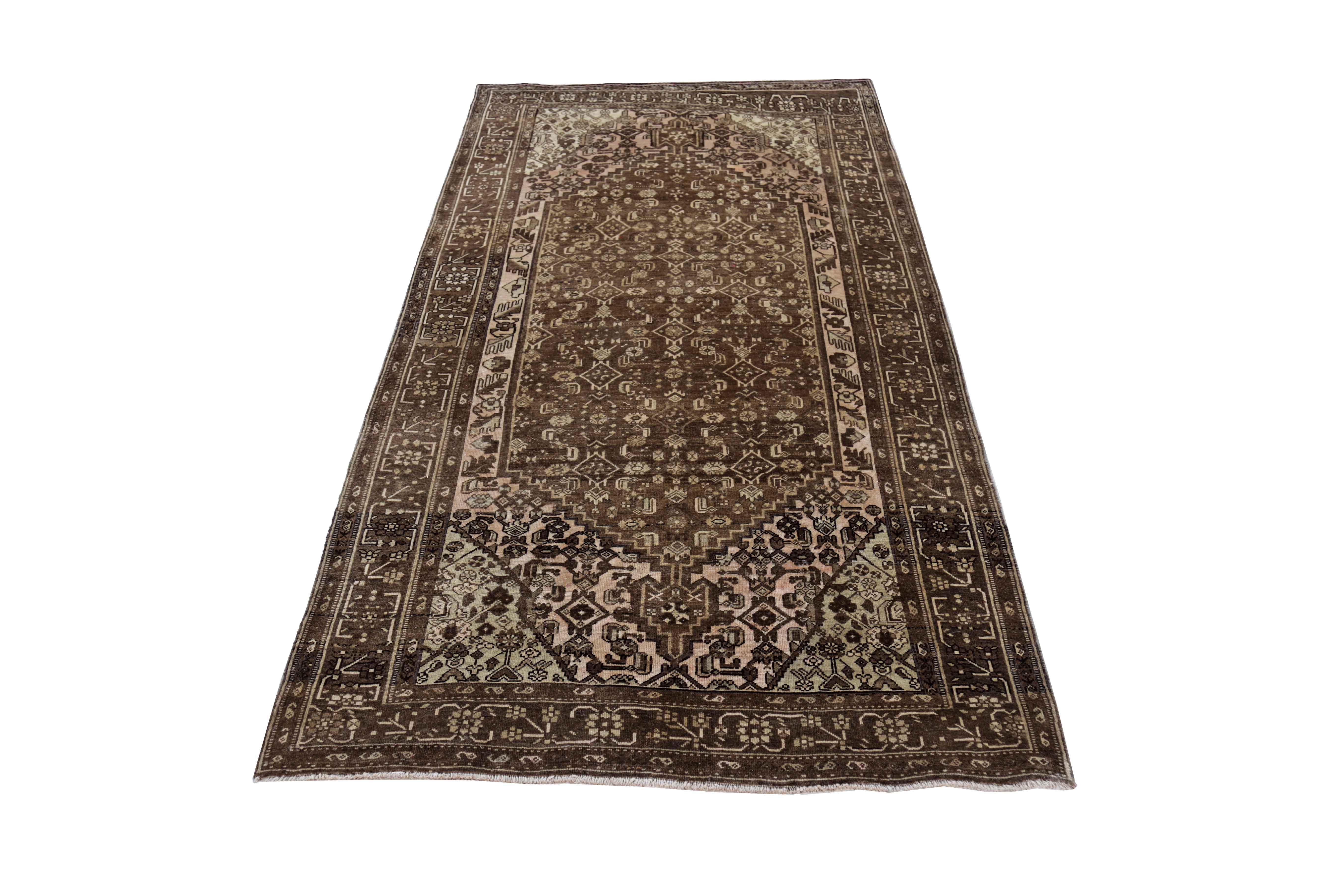 Antique Persian area rug handwoven from the finest sheep’s wool. It’s colored with all-natural vegetable dyes that are safe for humans and pets. It’s a traditional Bijar design handwoven by expert artisans. It’s a lovely area rug that can be