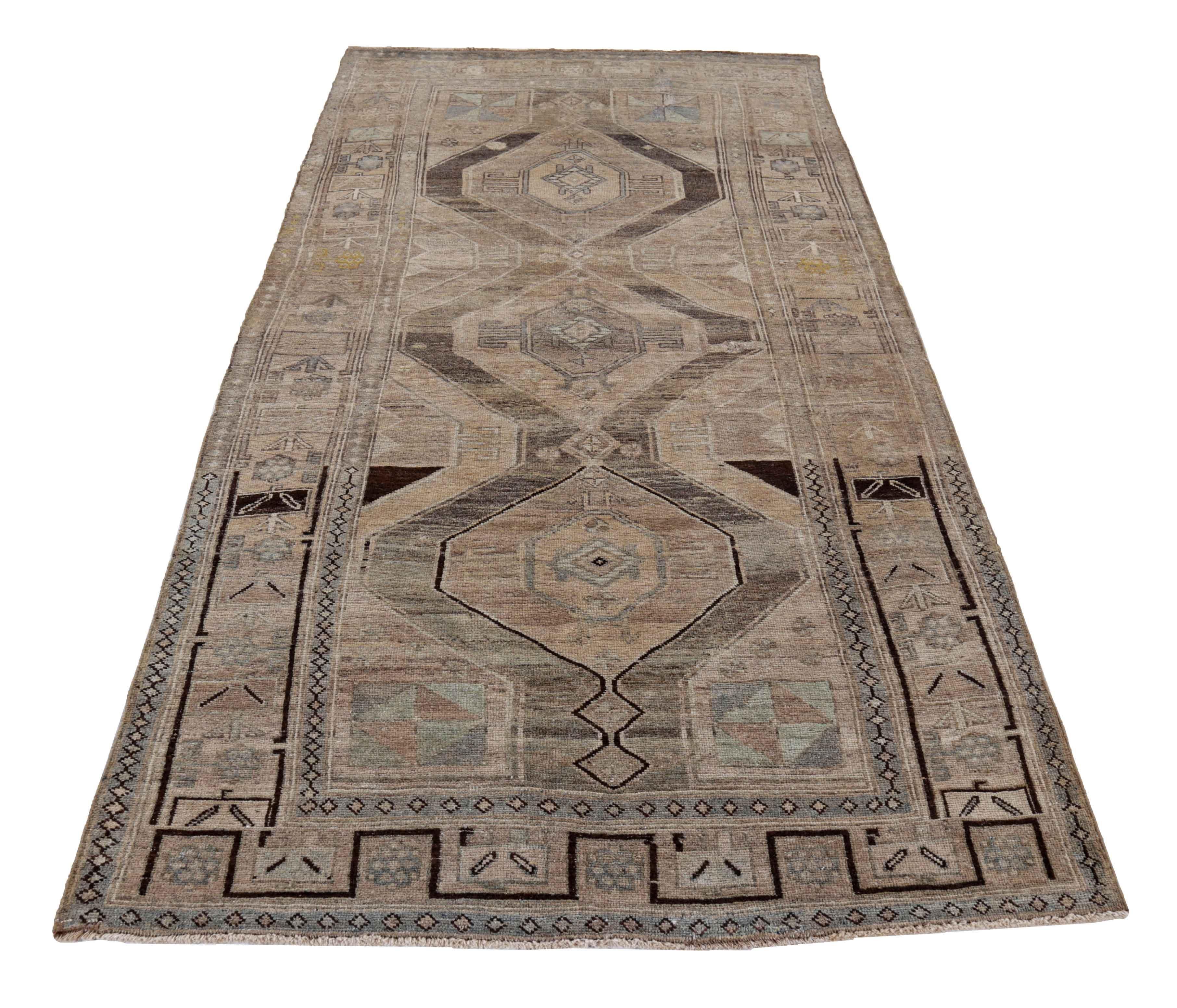 Antique Persian area rug handwoven from the finest sheep’s wool. It’s colored with all-natural vegetable dyes that are safe for humans and pets. It’s a traditional Bijar design handwoven by expert artisans. It’s a lovely area rug that can be