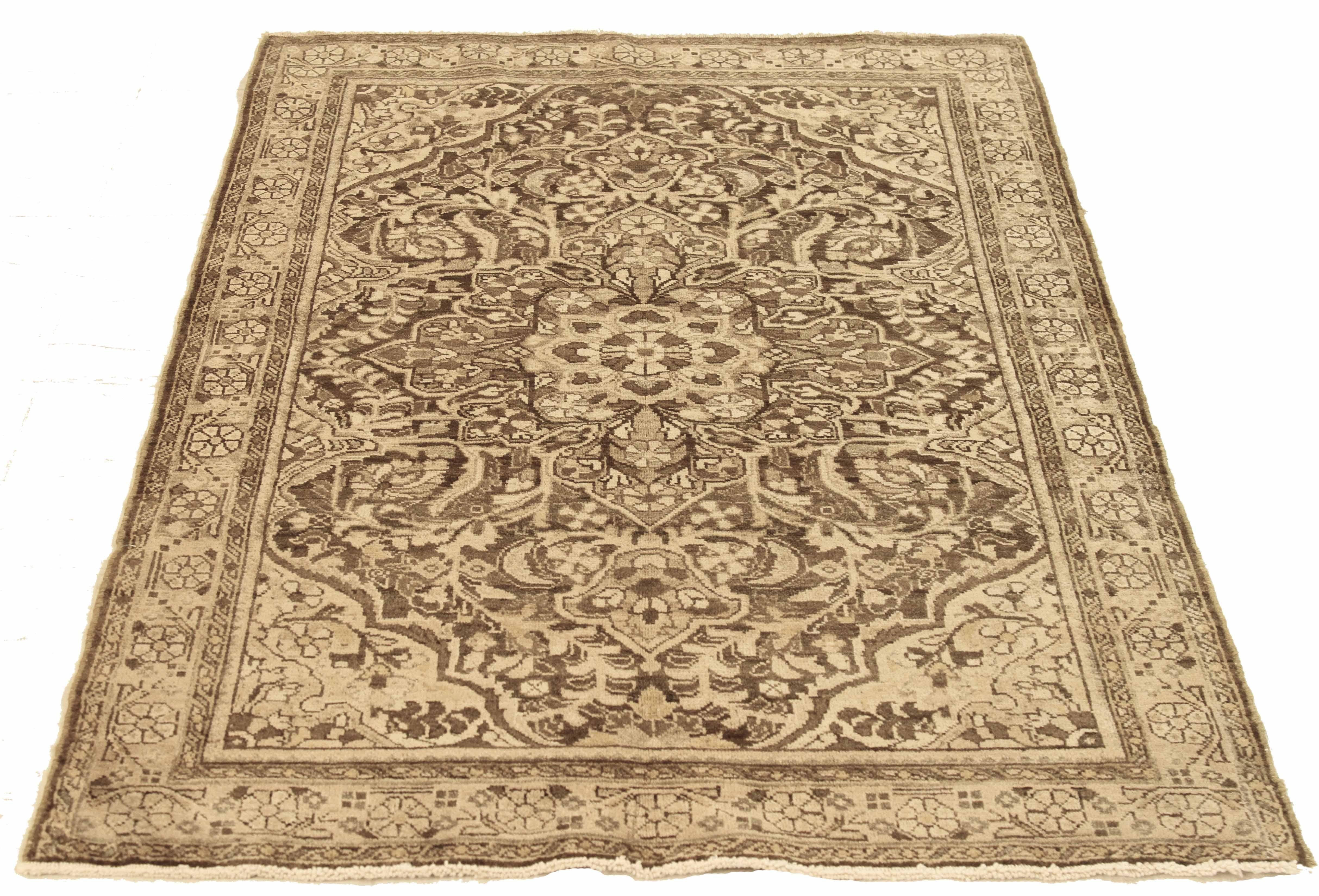 Antique Persian Area Rug - Handwoven with Premium Sheep's Wool & Natural Vegetable Dyes

This exquisite rug is handcrafted using the finest sheep's wool and colored with all-natural, safe-for-humans-and-pets vegetable dyes. It features a traditional