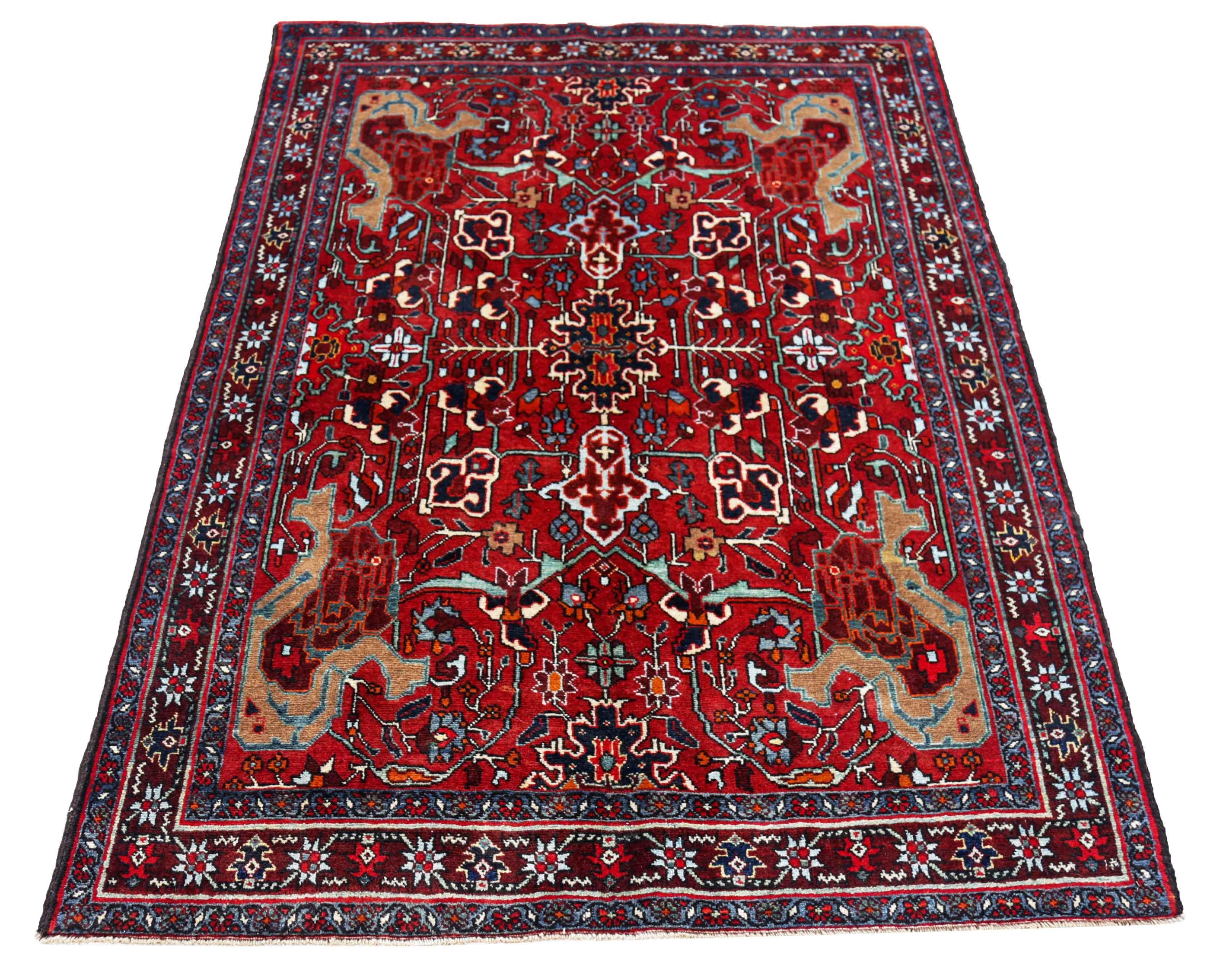 Antique Persian area rug handwoven from the finest sheep’s wool. It’s colored with all-natural vegetable dyes that are safe for humans and pets. It’s a traditional Heriz design handwoven by expert artisans. It’s a lovely area rug that can be