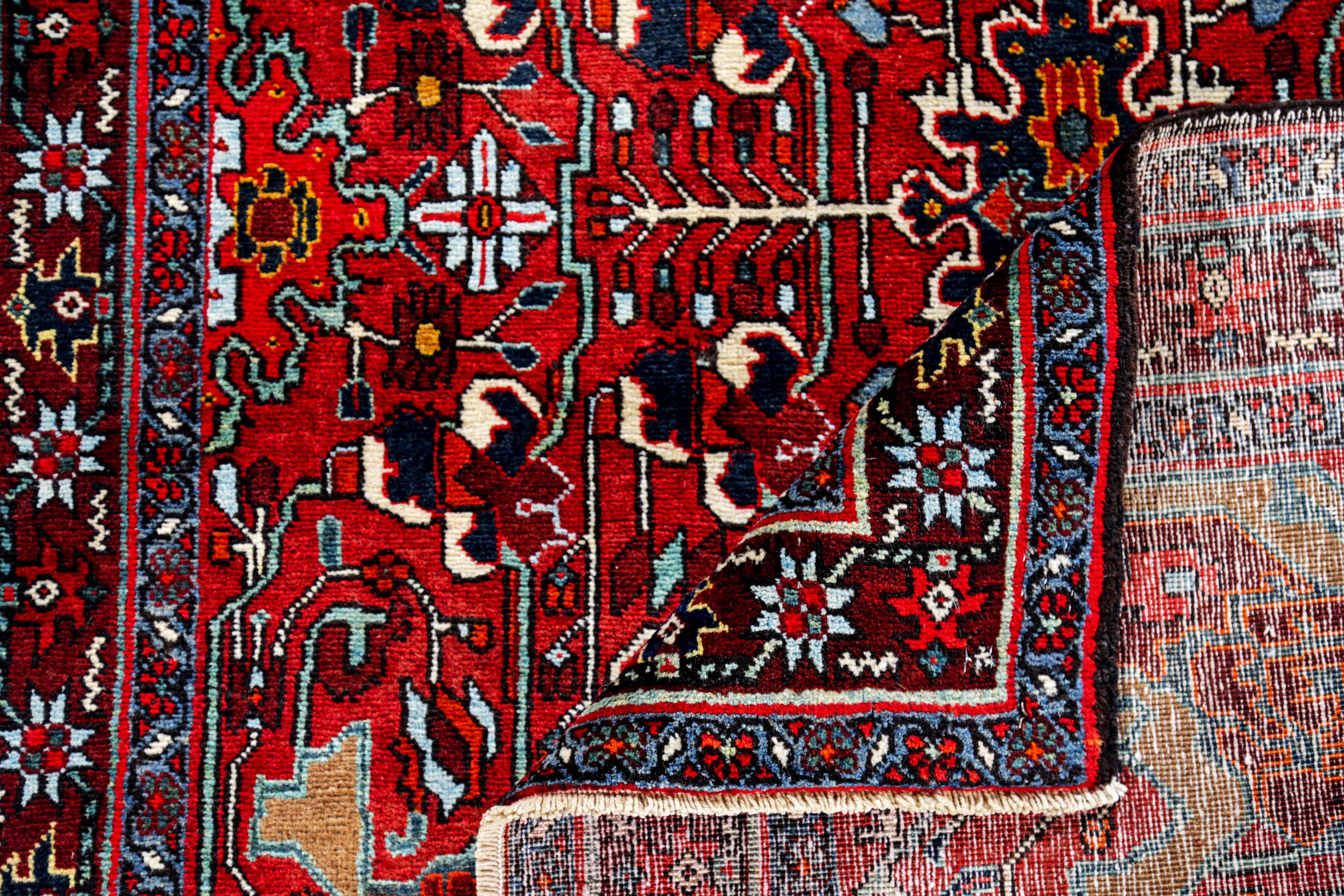 20th Century Antique Persian Area Rug Heriz Design For Sale