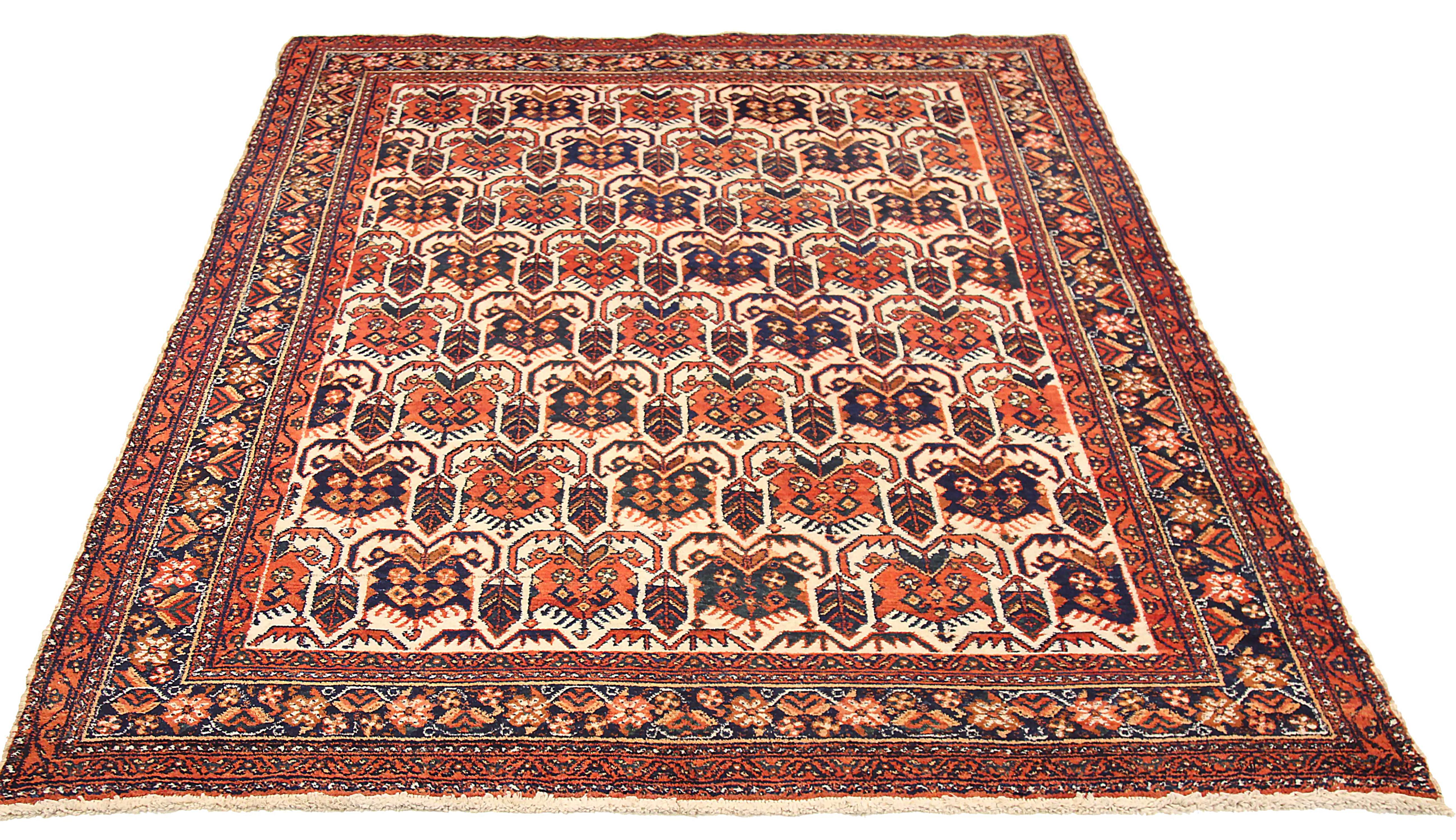 Antique Persian area rug handwoven from the finest sheep’s wool. It’s colored with all-natural vegetable dyes that are safe for humans and pets. It’s a traditional Isfahan design handwoven by expert artisans. It’s a lovely area rug that can be
