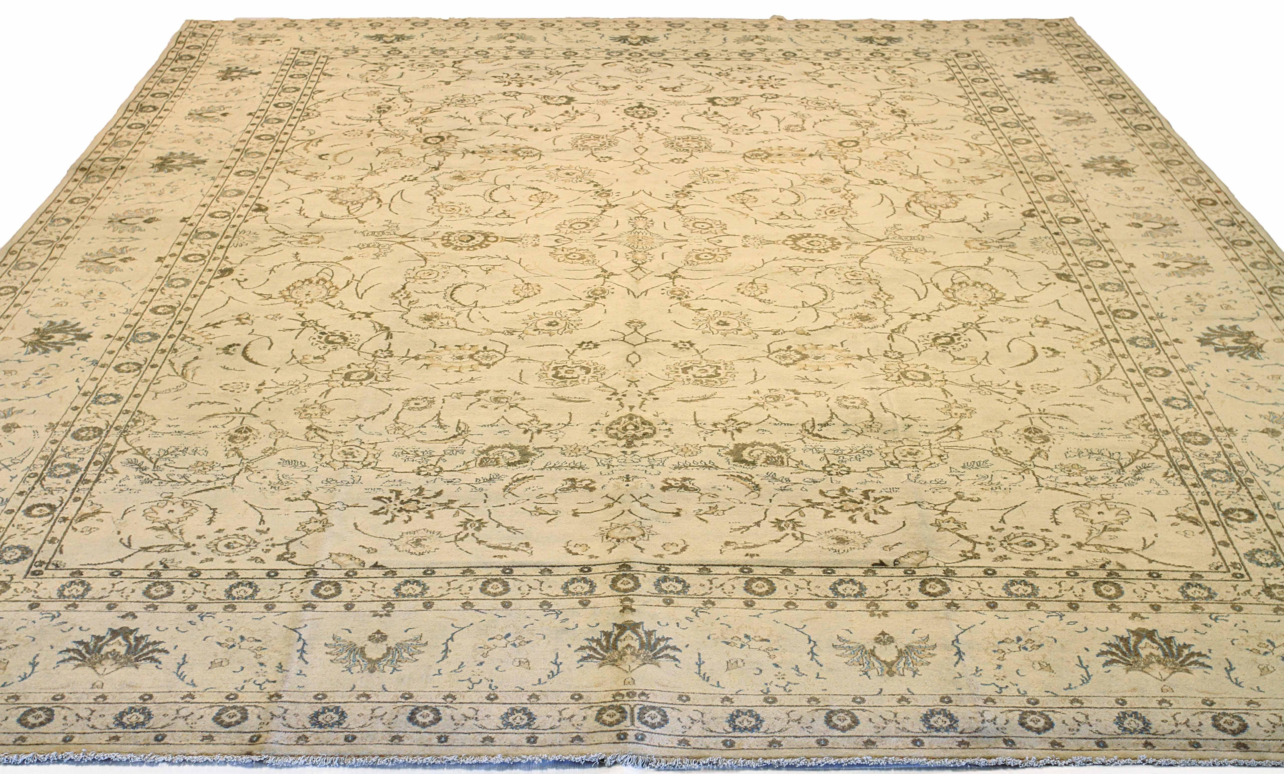 Bring an air of elegance and sophistication to your home with this exquisite Antique Persian Kashan rug. Handwoven from the finest sheep’s wool, it features rich, vibrant colors that are achieved using all-natural vegetable dyes, making it safe for