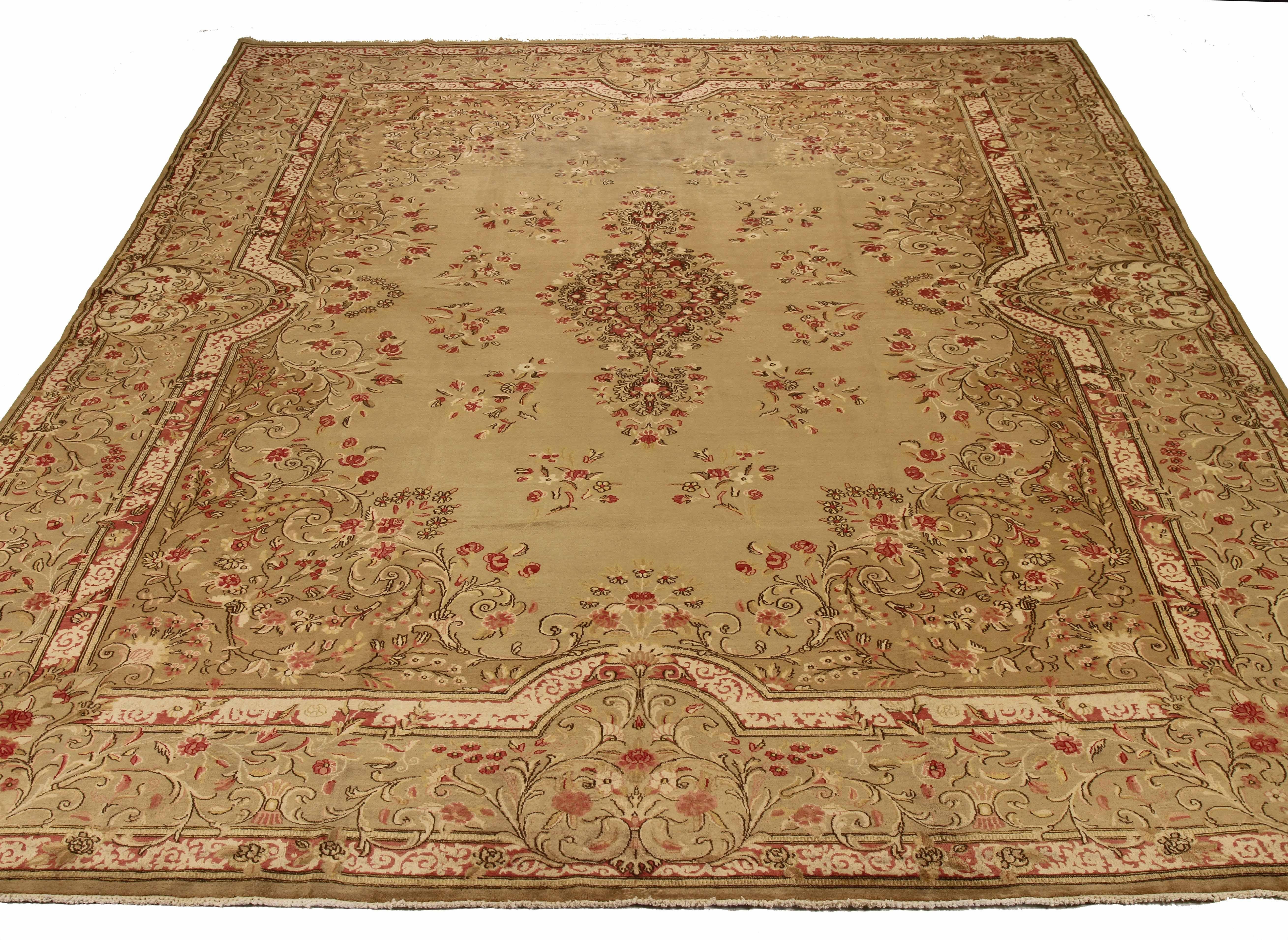 Antique Persian area rug handwoven from the finest sheep’s wool. It’s colored with all-natural vegetable dyes that are safe for humans and pets. It’s a traditional Kerman design handwoven by expert artisans. It’s a lovely area rug that can be