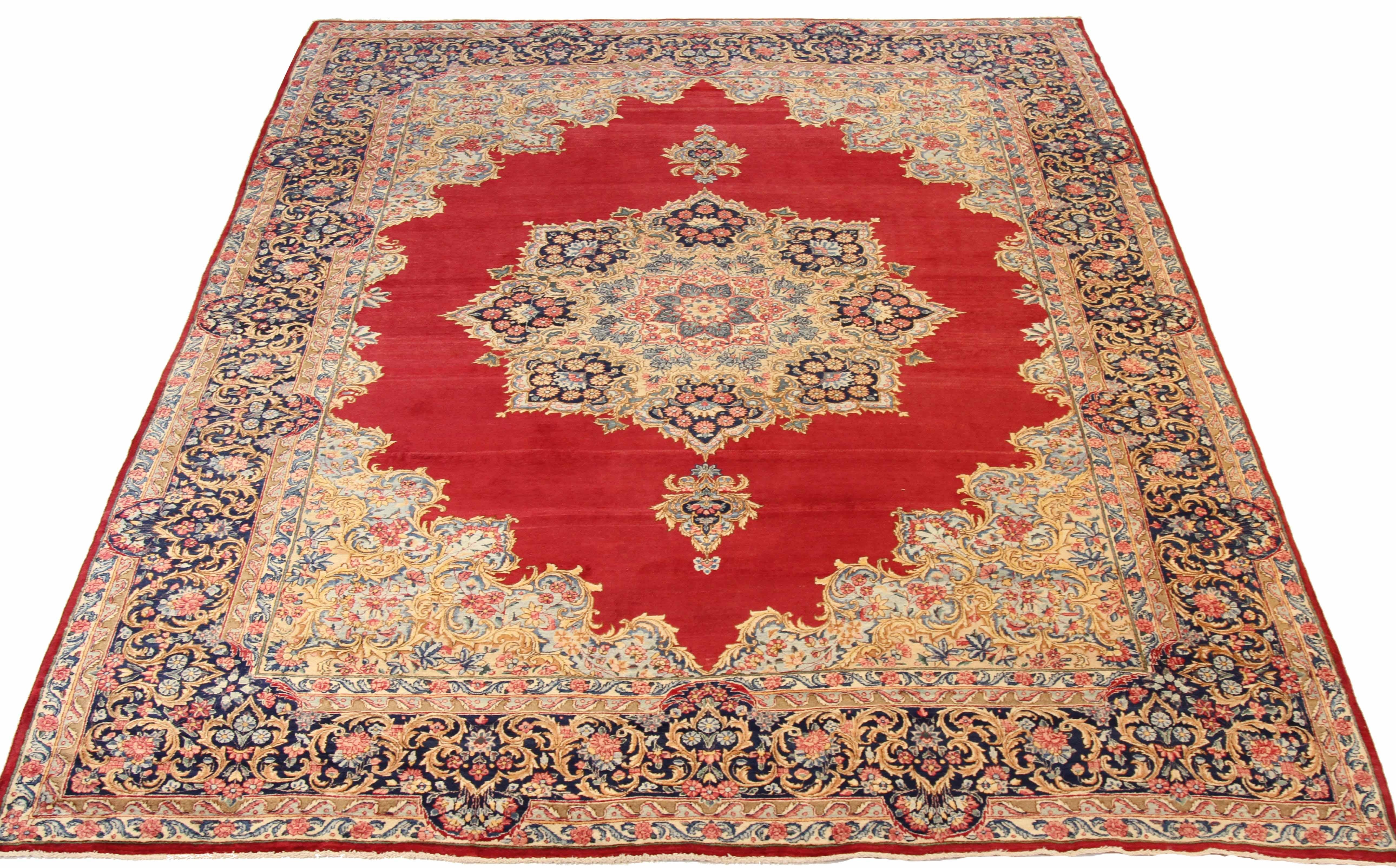 Antique Persian area rug handwoven from the finest sheep’s wool. It’s colored with all-natural vegetable dyes that are safe for humans and pets. It’s a traditional Kerman design handwoven by expert artisans. It’s a lovely area rug that can be