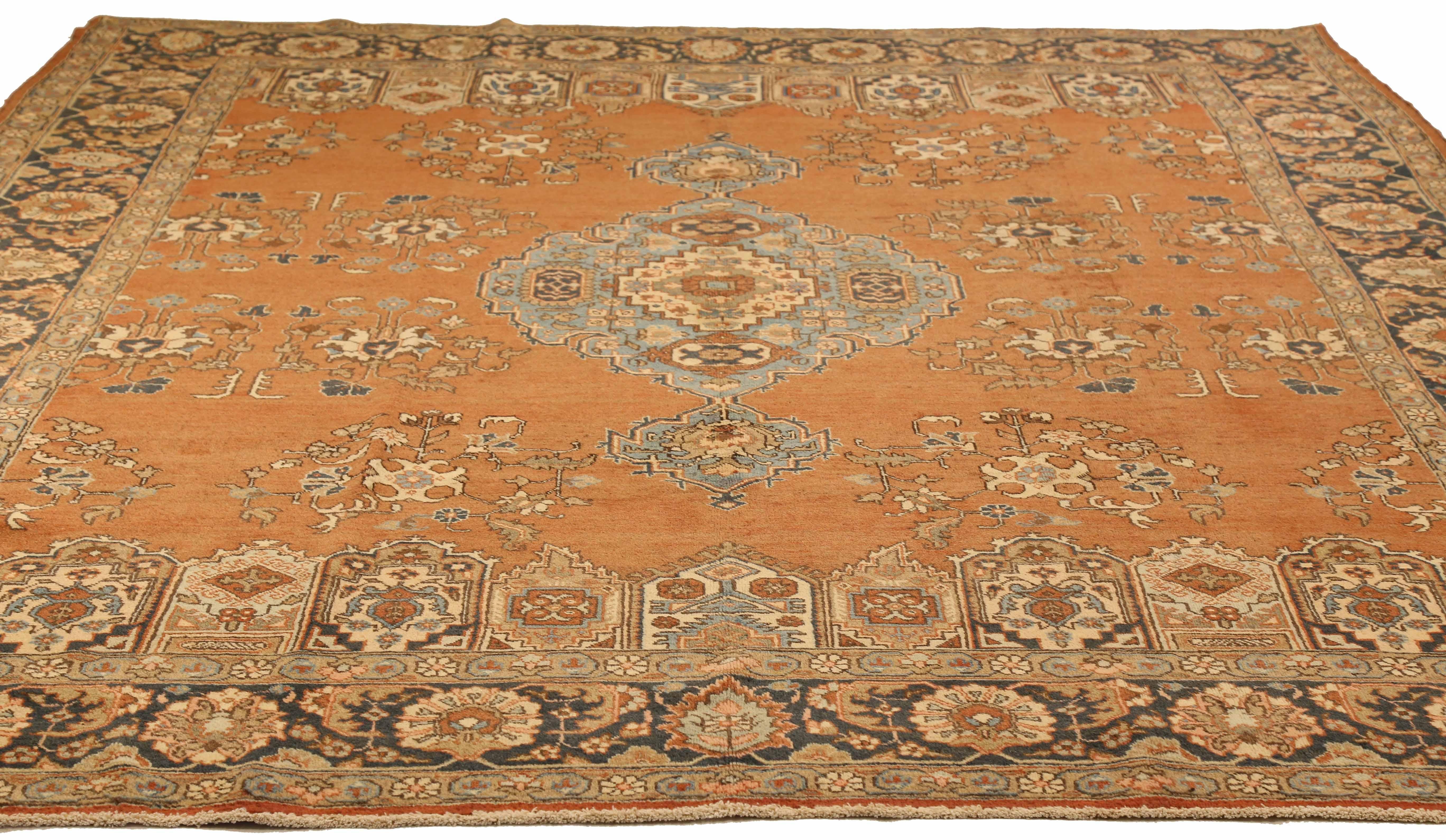 Antique Persian area rug handwoven from the finest sheep’s wool. It’s colored with all-natural vegetable dyes that are safe for humans and pets. It’s a traditional Khoy design handwoven by expert artisans. It’s a lovely area rug that can be