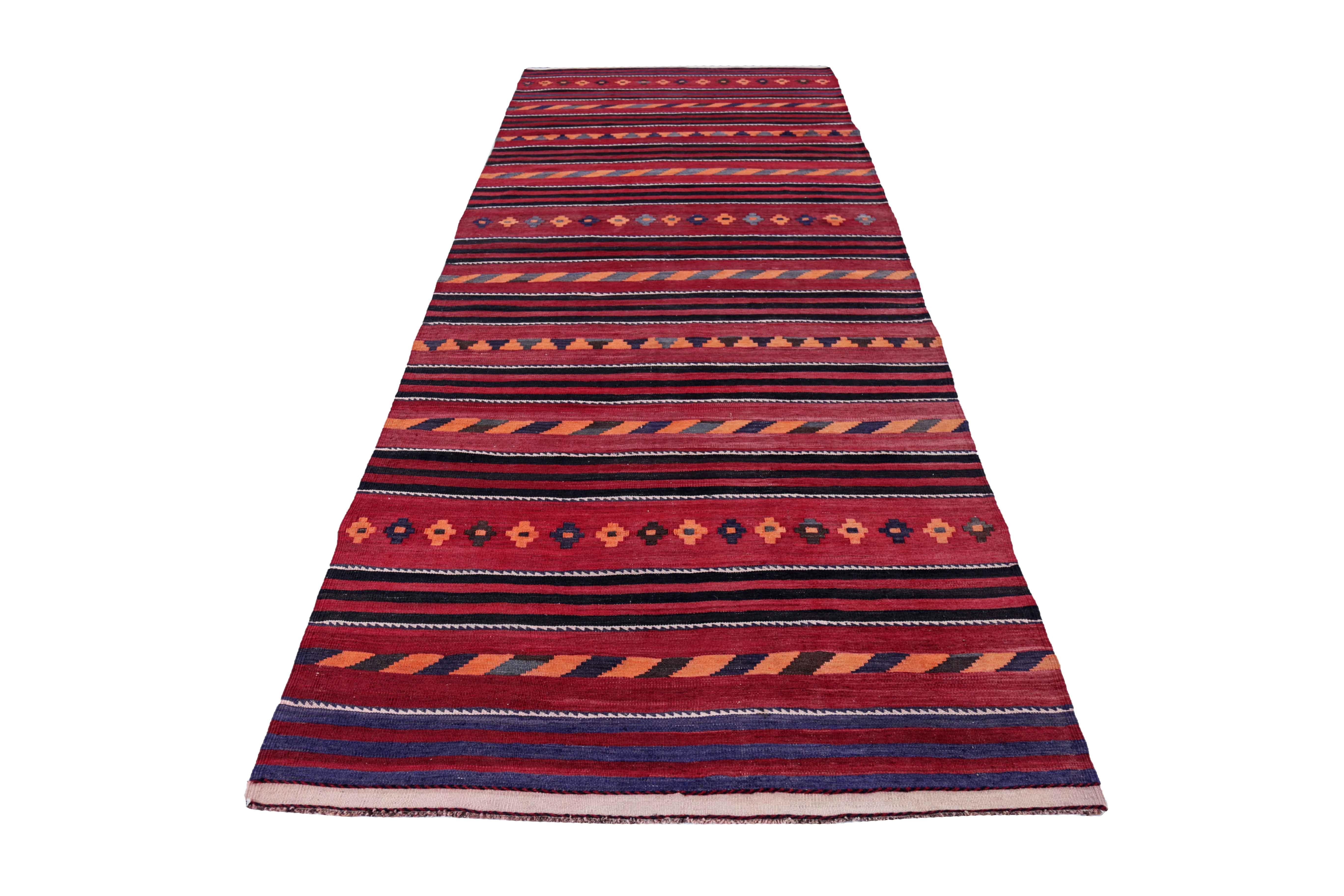 Antique Persian area rug handwoven from the finest sheep’s wool. It’s colored with all-natural vegetable dyes that are safe for humans and pets. It’s a traditional Kilim design handwoven by expert artisans. It’s a lovely area rug that can be