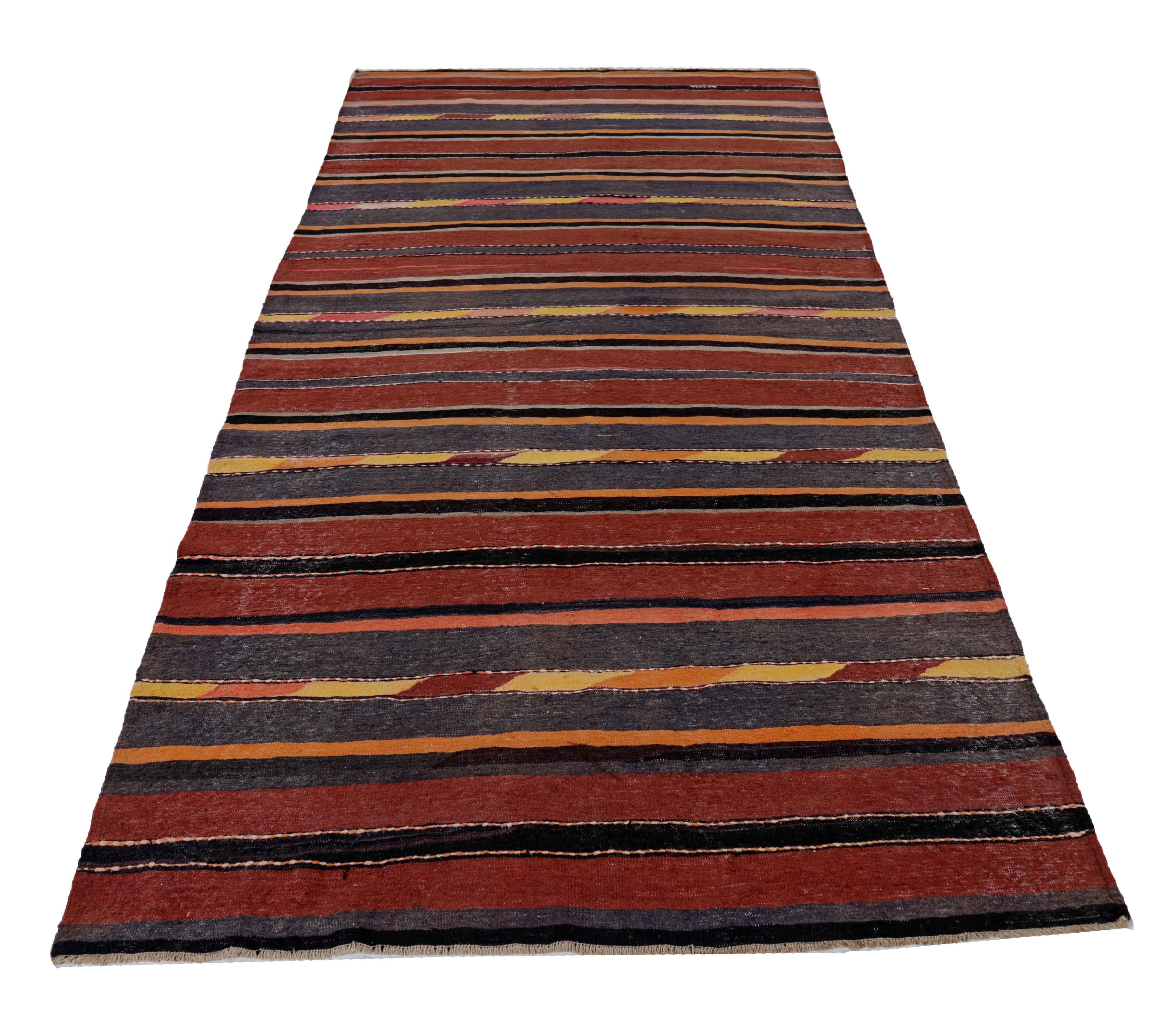 Antique Persian area rug handwoven from the finest sheep’s wool. It’s colored with all-natural vegetable dyes that are safe for humans and pets. It’s a traditional Kilim design handwoven by expert artisans. It’s a lovely area rug that can be