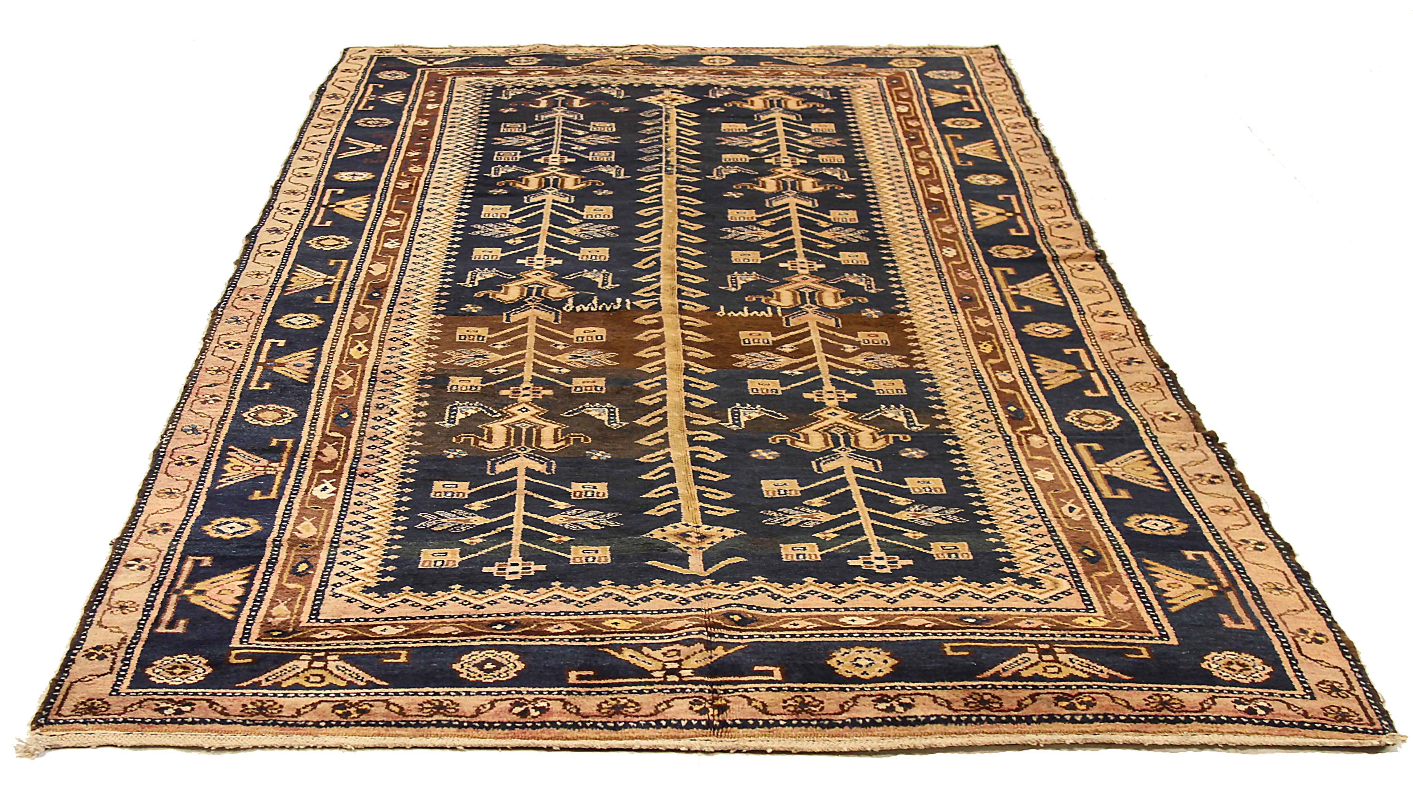 Antique Persian area rug handwoven from the finest sheep’s wool. It’s colored with all-natural vegetable dyes that are safe for humans and pets. It’s a traditional Kolyai design handwoven by expert artisans. It’s a lovely area rug that can be