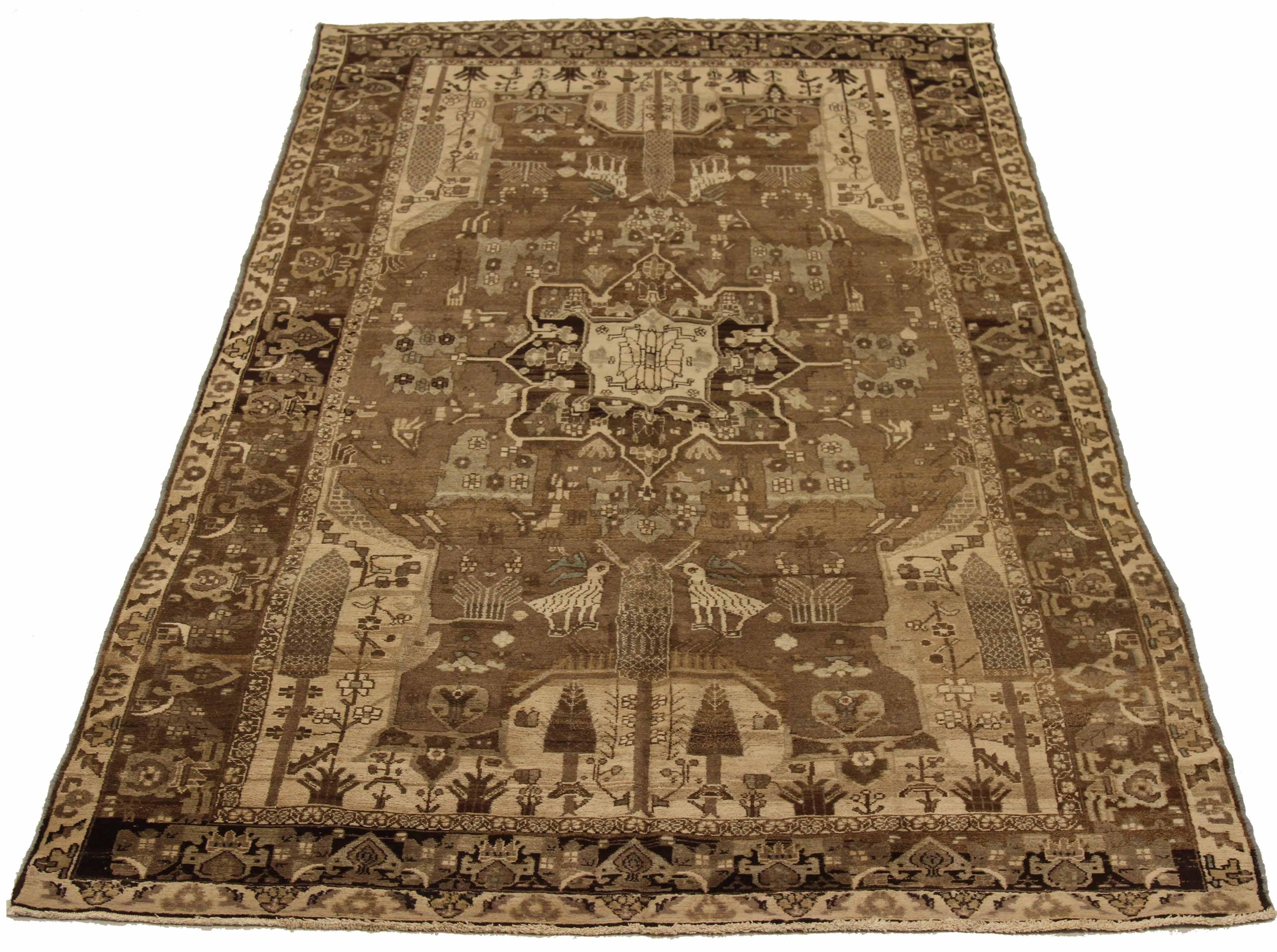Antique Persian area rug handwoven from the finest sheep’s wool. It’s colored with all-natural vegetable dyes that are safe for humans and pets. It’s a traditional Kolyai design handwoven by expert artisans. It’s a lovely area rug that can be