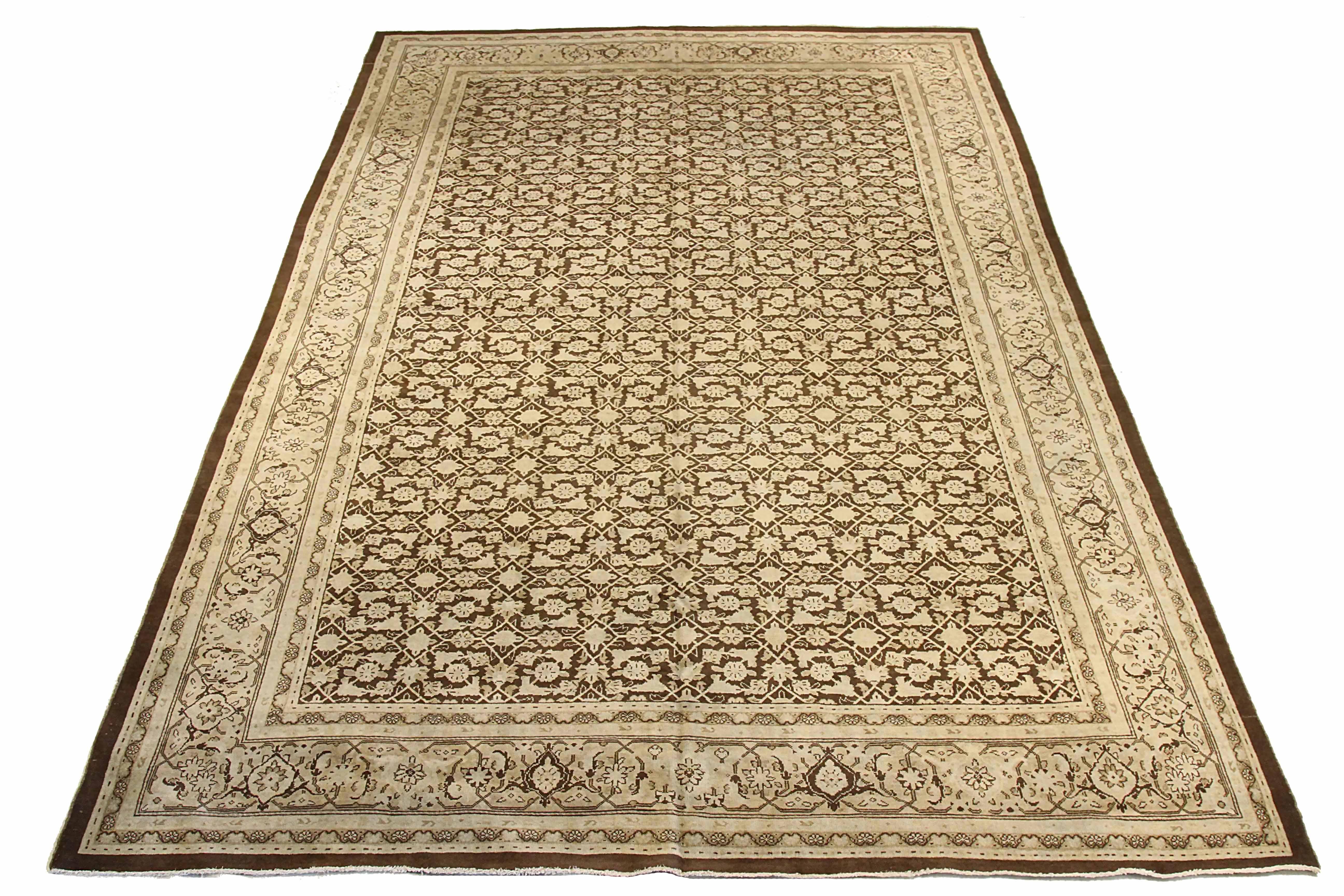 Antique Persian area rug handwoven from the finest sheep’s wool. It’s colored with all-natural vegetable dyes that are safe for humans and pets. It’s a traditional Mahal design handwoven by expert artisans. It’s a lovely area rug that can be