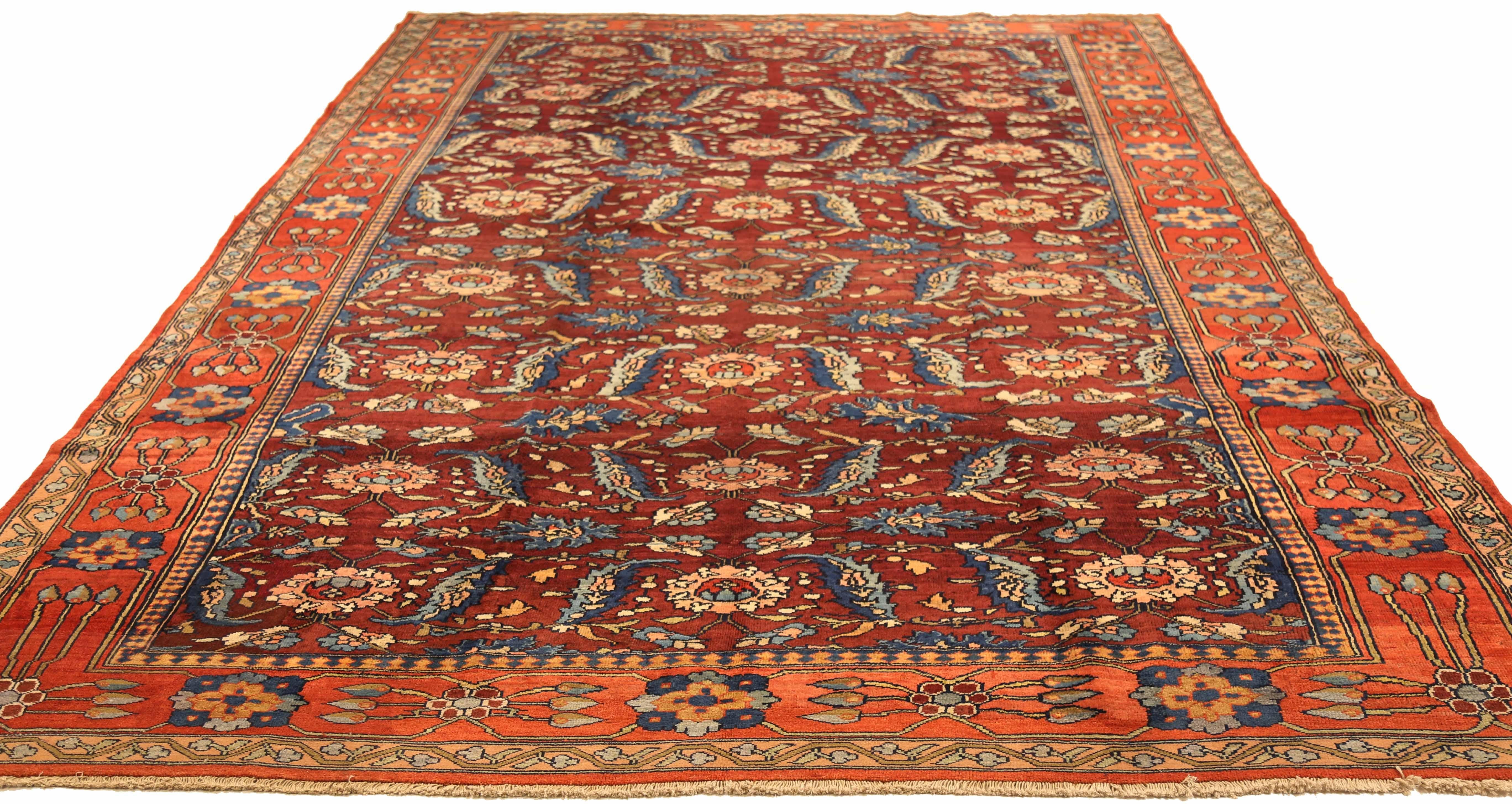 Antique Persian Mahal Area Rug: Handcrafted from premium quality sheep's wool, colored with all-natural vegetable dyes that are safe for both humans and pets. Featuring a traditional Mahal design, handwoven by skilled artisans, this vintage rug