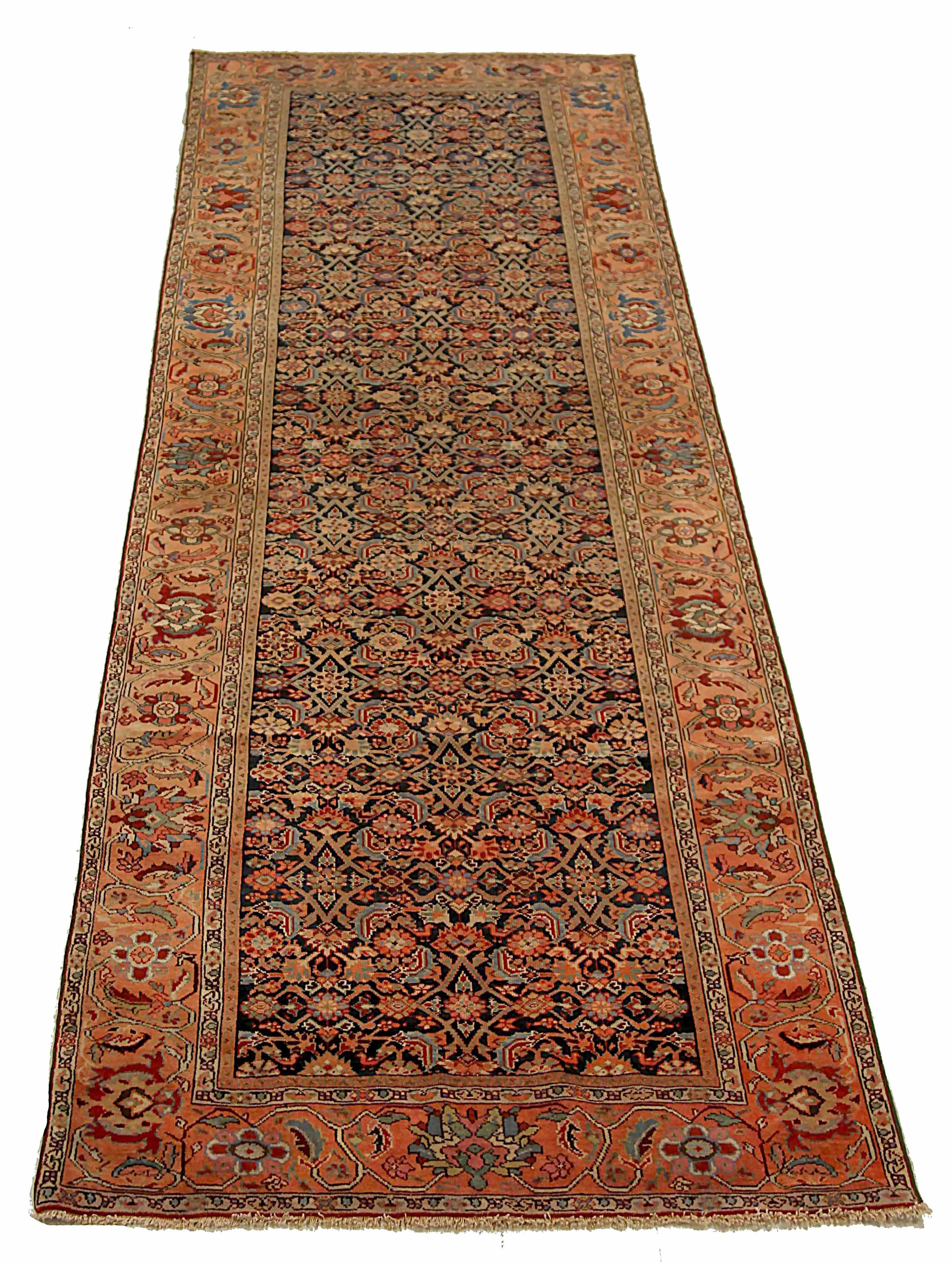 Antique Persian area rug handwoven from the finest sheep’s wool. It’s colored with all-natural vegetable dyes that are safe for humans and pets. It’s a traditional Malayer design handwoven by expert artisans. It’s a lovely area rug that can be