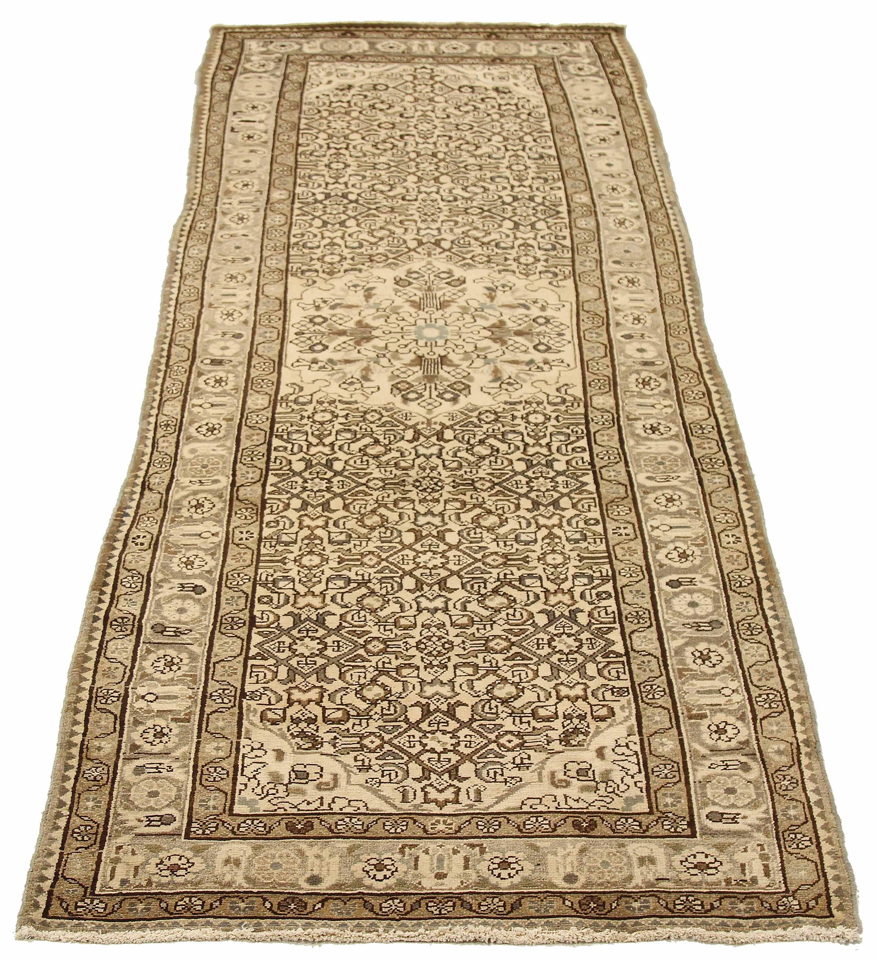 Antique Persian area rug handwoven from the finest sheep’s wool. It’s colored with all-natural vegetable dyes that are safe for humans and pets. It’s a traditional Malayer design handwoven by expert artisans. It’s a lovely area rug that can be