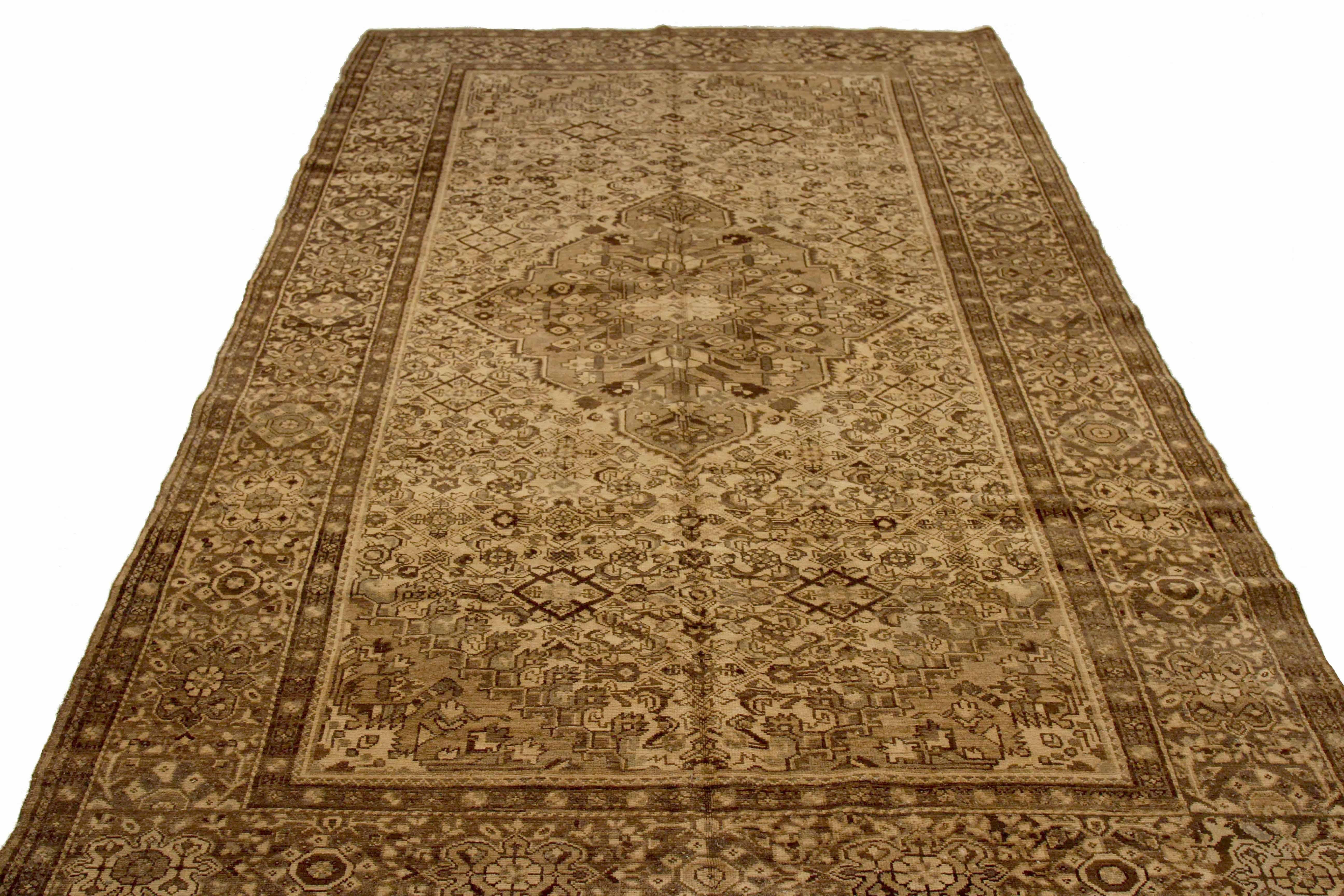 Antique Persian area rug handwoven from the finest sheep’s wool. It’s colored with all-natural vegetable dyes that are safe for humans and pets. It’s a traditional Malayer design handwoven by expert artisans. It’s a lovely area rug that can be