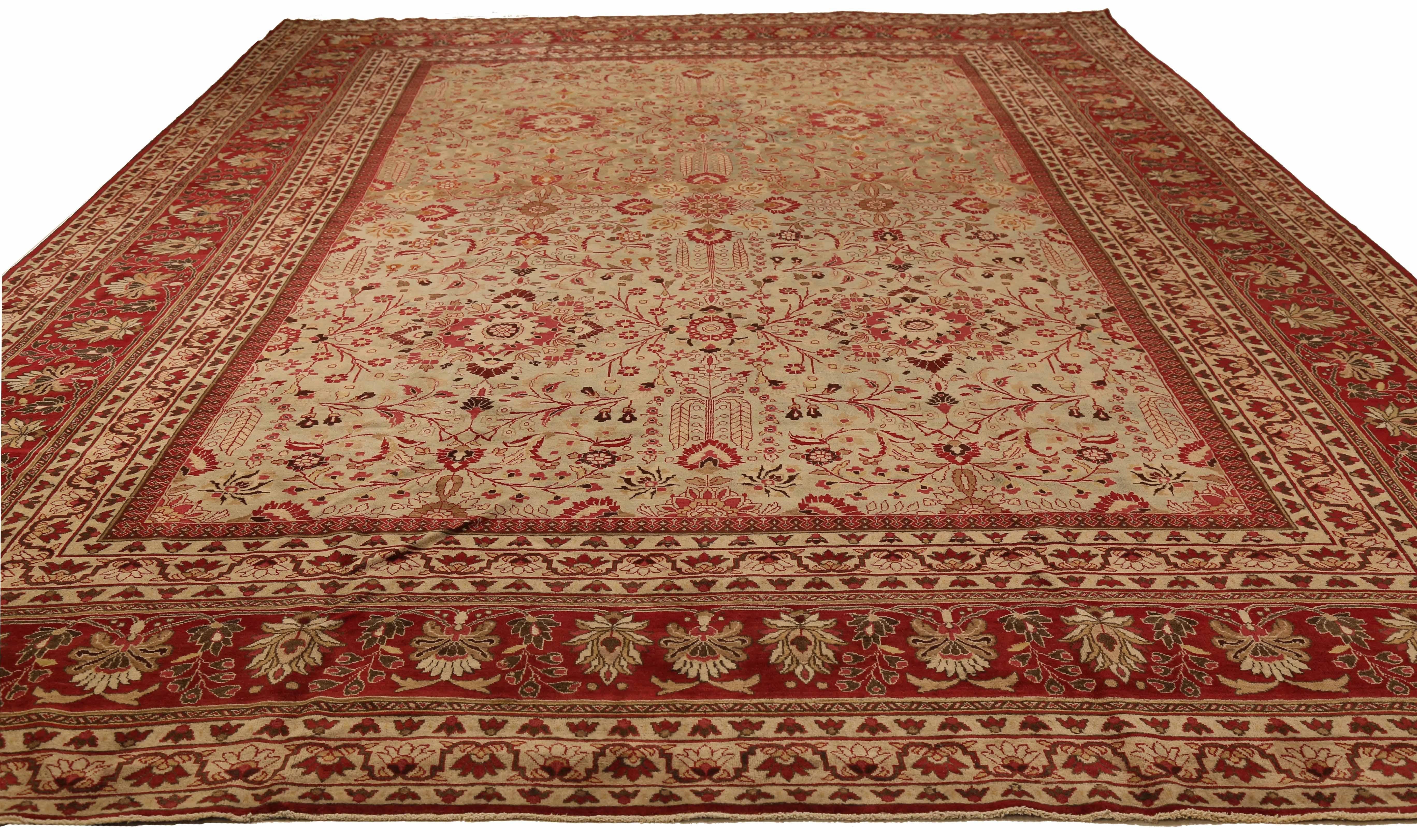 Antique Persian area rug handwoven from the finest sheep’s wool. It’s colored with all-natural vegetable dyes that are safe for humans and pets. It’s a traditional Mashad design handwoven by expert artisans.It’s a lovely area rug that can be