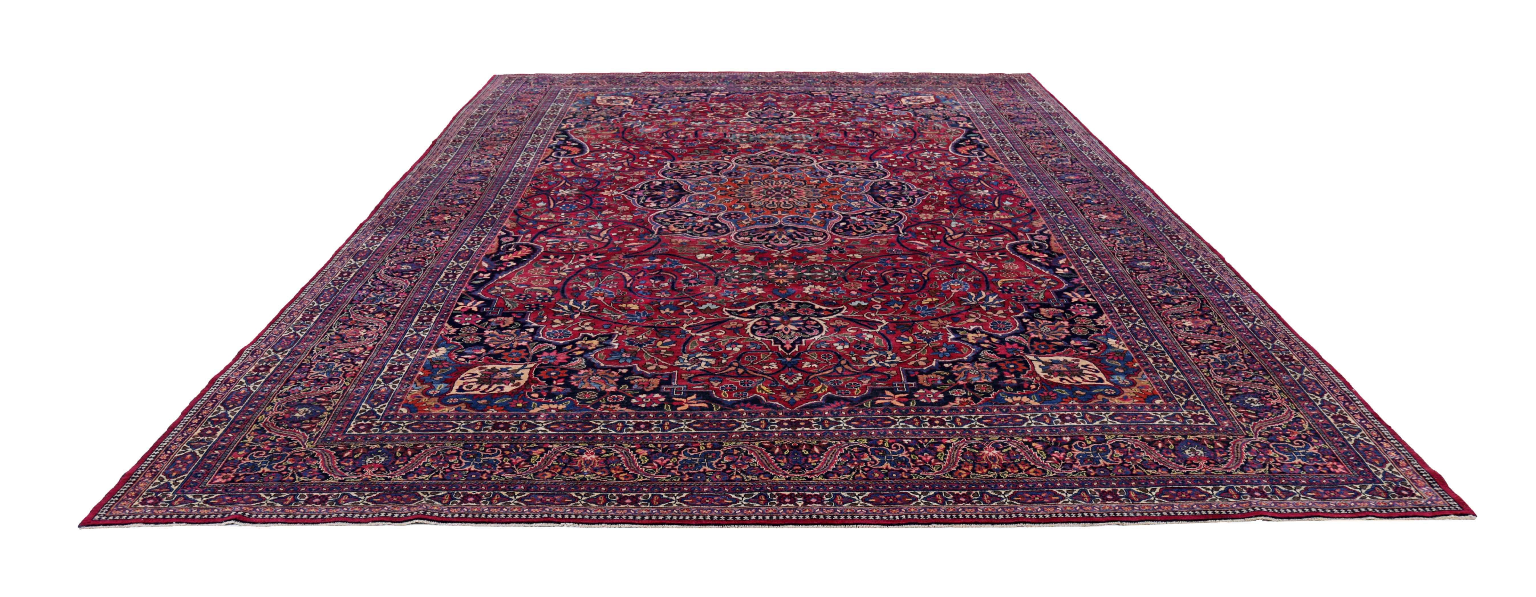 Antique Persian area rug handwoven from the finest sheep’s wool. It’s colored with all-natural vegetable dyes that are safe for humans and pets. It’s a traditional Mashad design handwoven by expert artisans.It’s a lovely area rug that can be