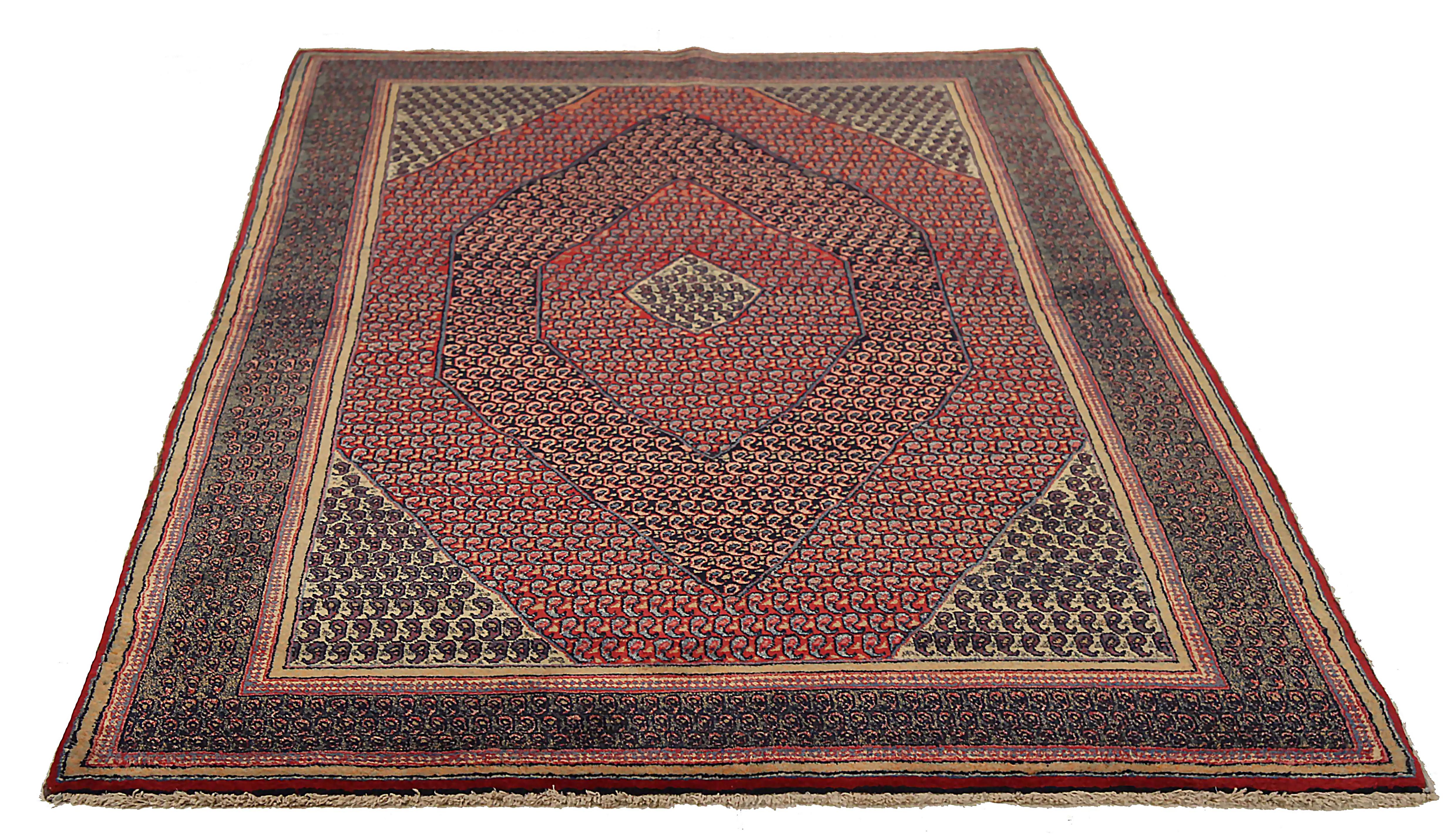 Antique Persian area rug handwoven from the finest sheep’s wool. It’s colored with all-natural vegetable dyes that are safe for humans and pets. It’s a traditional Mashad design handwoven by expert artisans. It’s a lovely area rug that can be